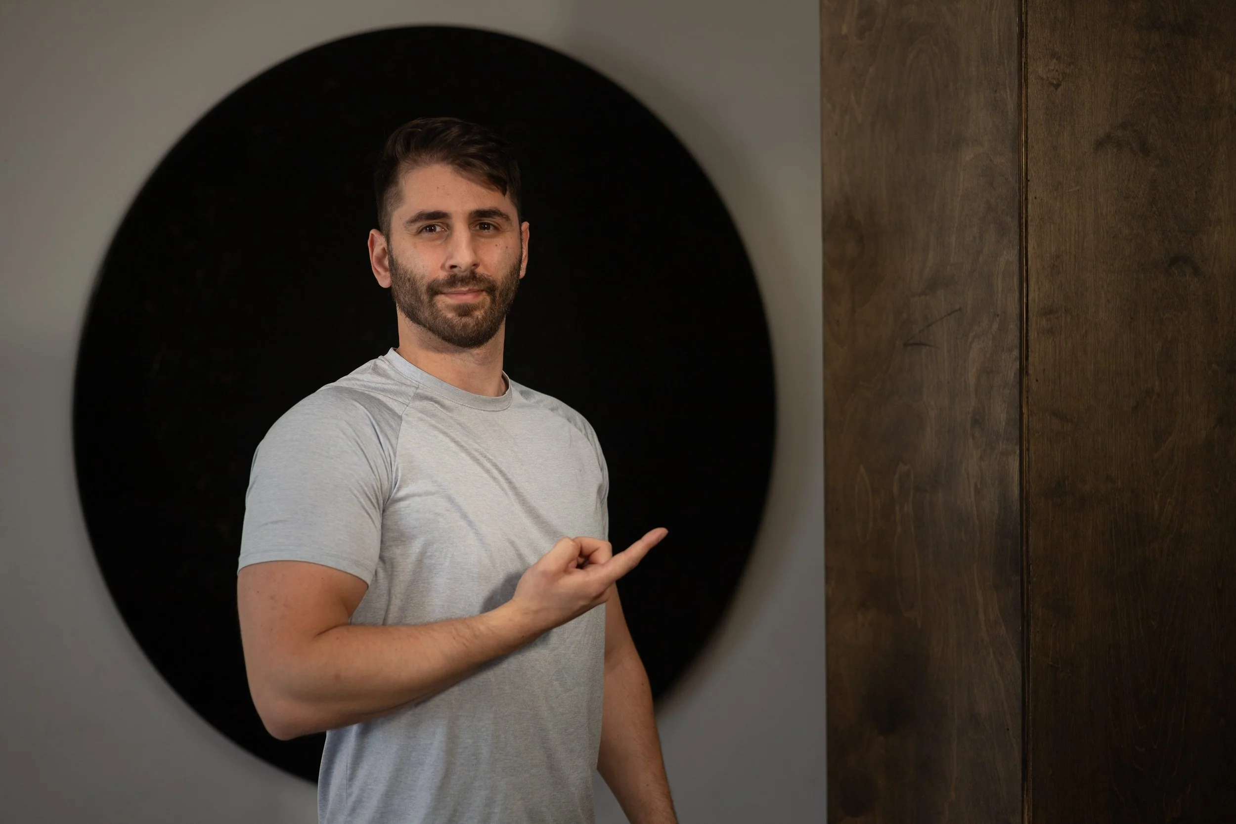 Coach Mike on a free one-hour Zoom consultation call, reviewing a client's health, daily habits, and lifestyle goals to build a personalized coaching plan.