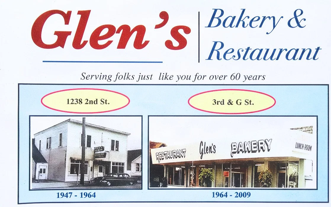Sign for Glen's Bakery & Restaurant with two photos of the restaurant's location and signage. The first photo shows a building at 1238 2nd St. used from 1947 to 1964, and the second photo shows a newer storefront at 3rd & G St. used from 1964 to 2009.