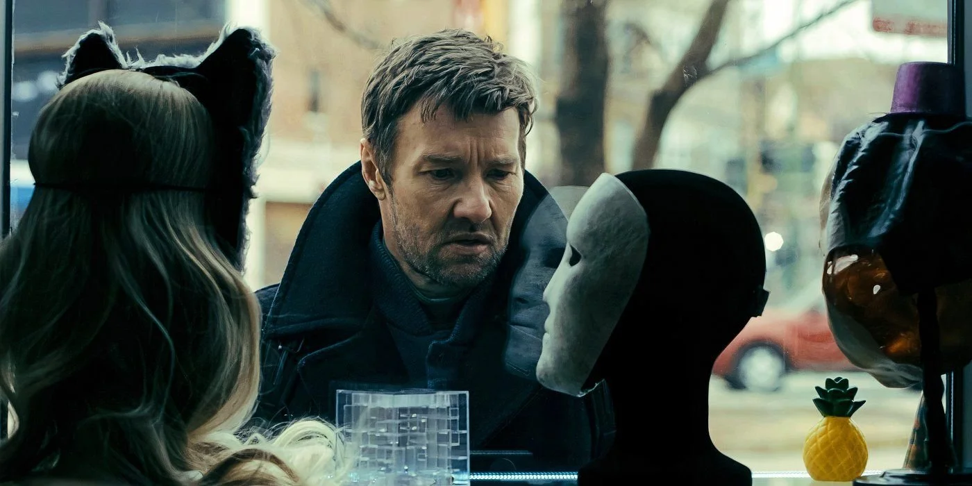 jason1-looks-at-masks-through-a-shop-winodw-in-dark-matter.jpg