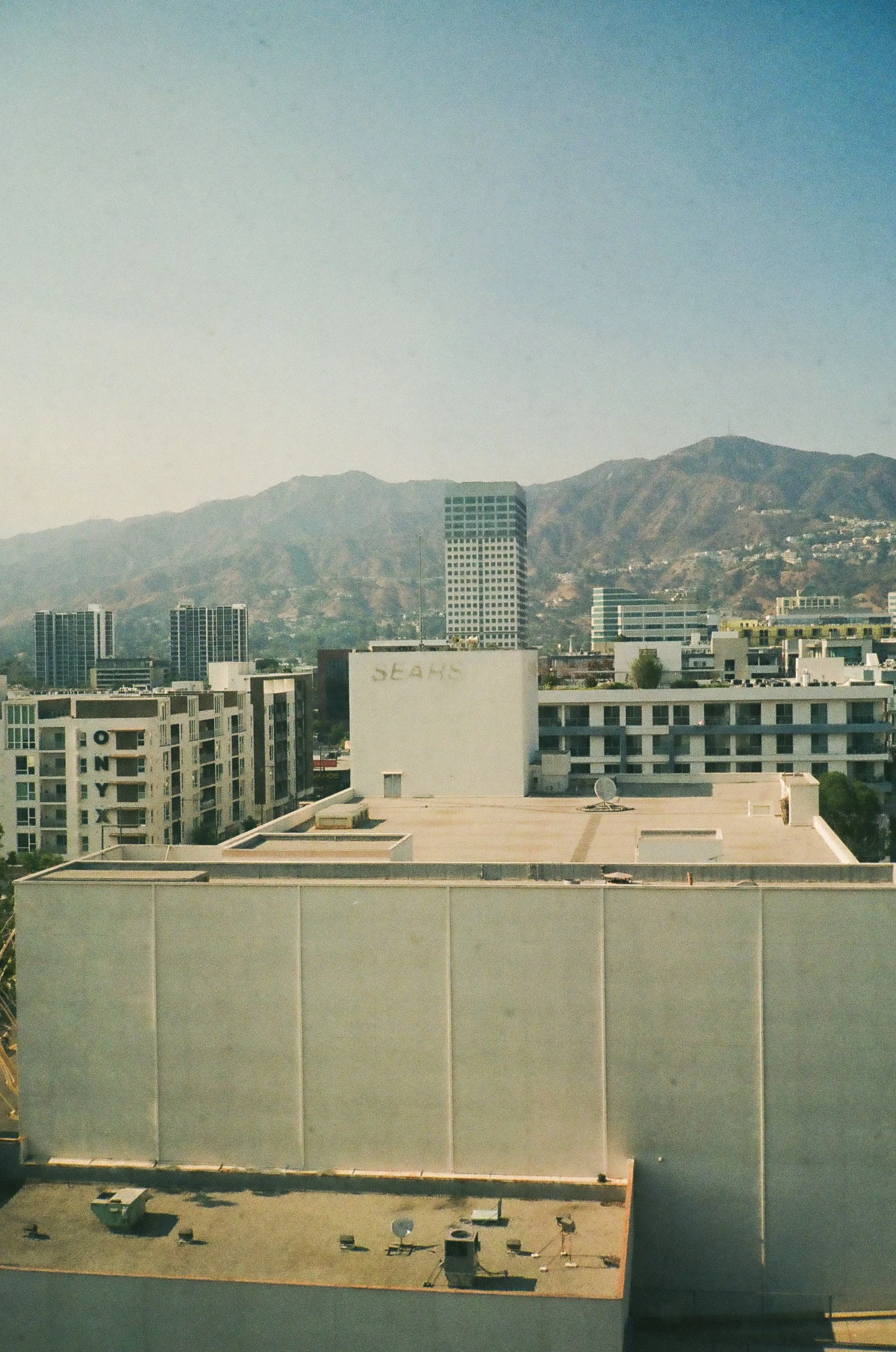 An abandoned Sears building stands out amongst the Glendale, CA landscape.