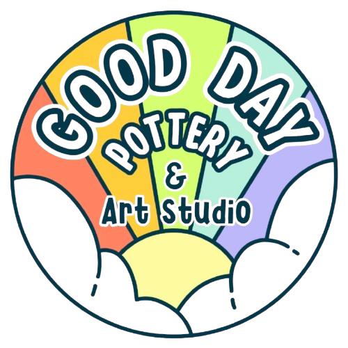 Colorful circular logo for 'Good Day Pottery & Art Studio' featuring a rainbow of colors and art supplies.