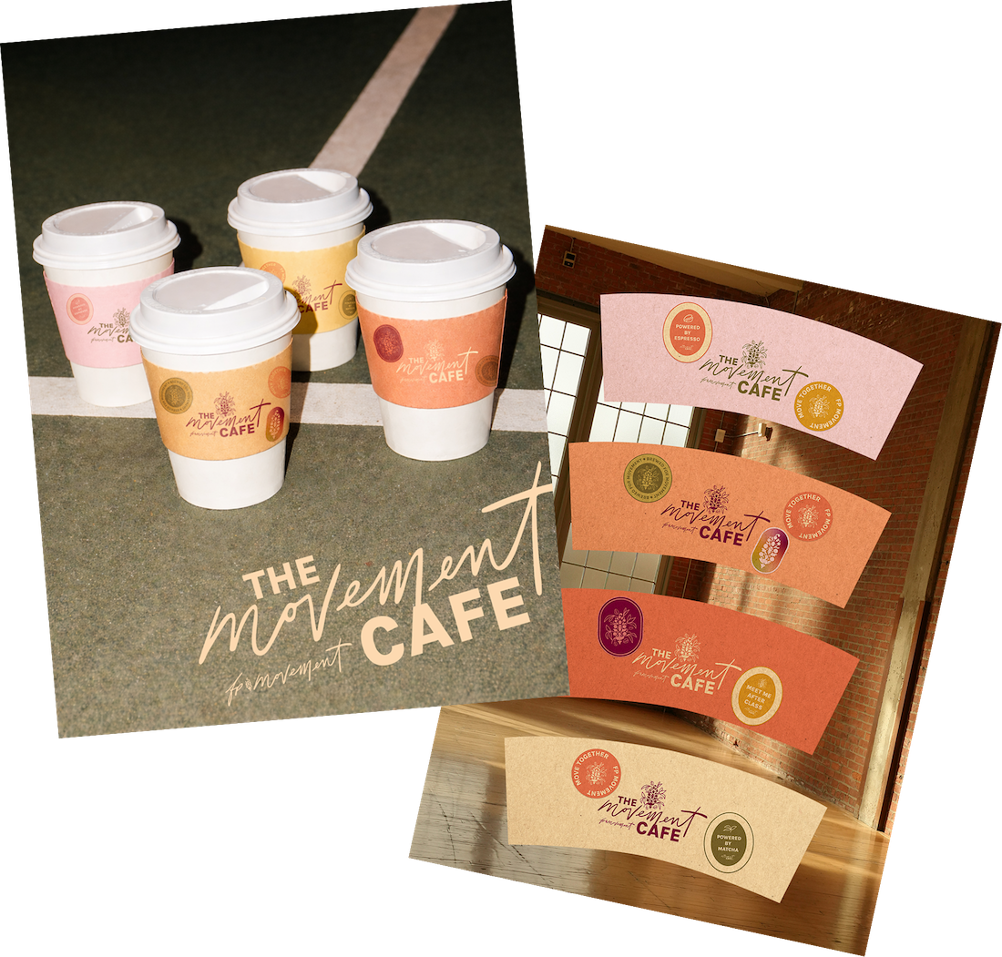 Four Starbucks coffee cups with pink, yellow, orange, and peach sleeve designs featuring The Movement Cafe logo, positioned on a paved surface with parking lot lines. An open book displays colorful cards with The Movement Cafe logo and various themed stickers inside.