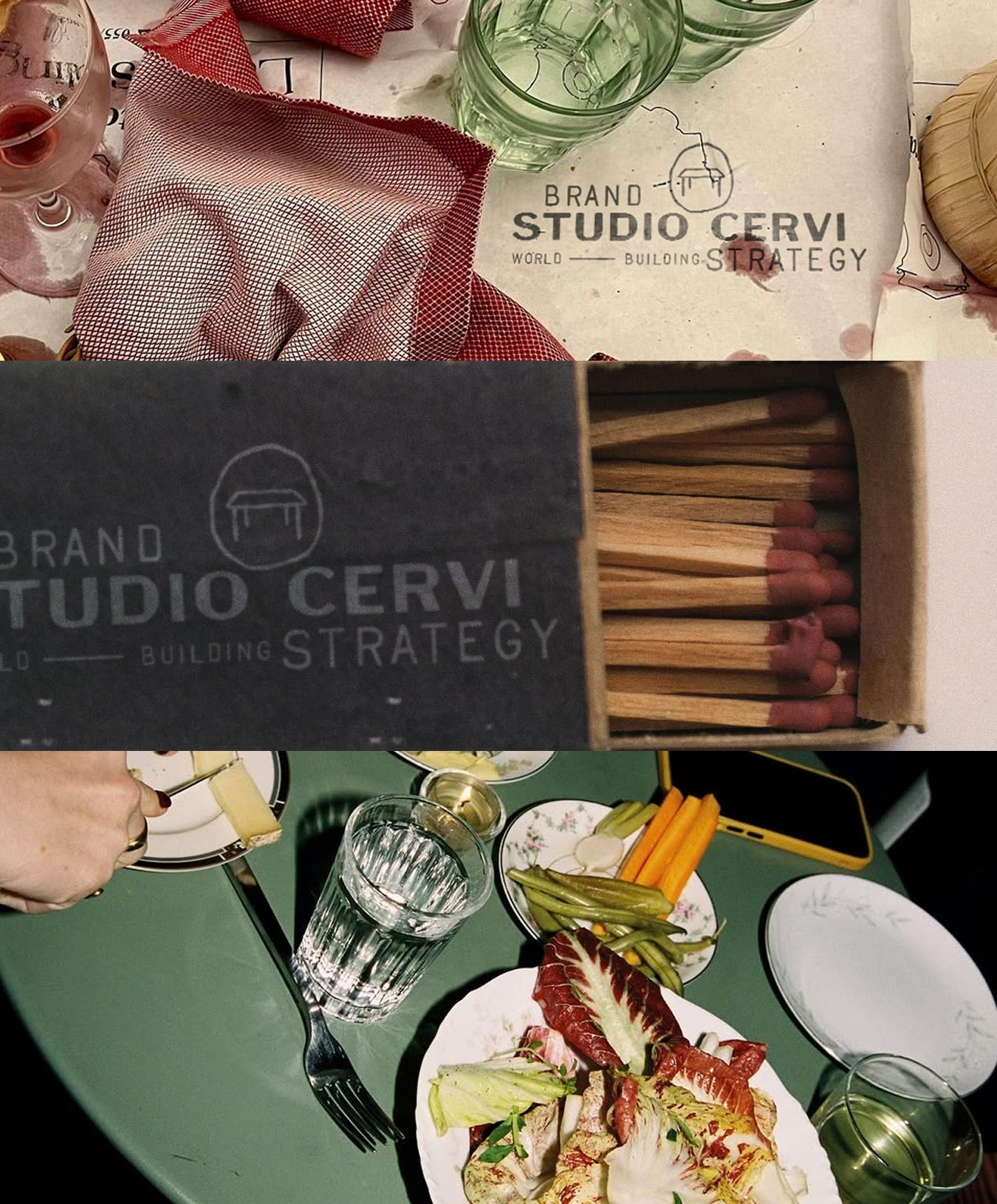 A table set with various dishes, including a salad with leafy greens, radicchio, and endives, along with glasses of water. There is a tray of sliced vegetables such as carrots, celery, and cucumbers, and a box of matches. Part of a hand is visible, holding a piece of cheese on a fork.