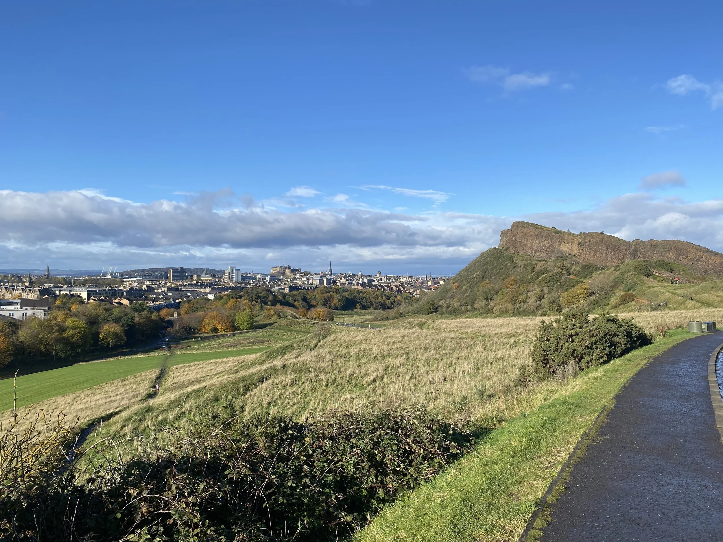 View of Salsbury craggs with Edinburgh in the background