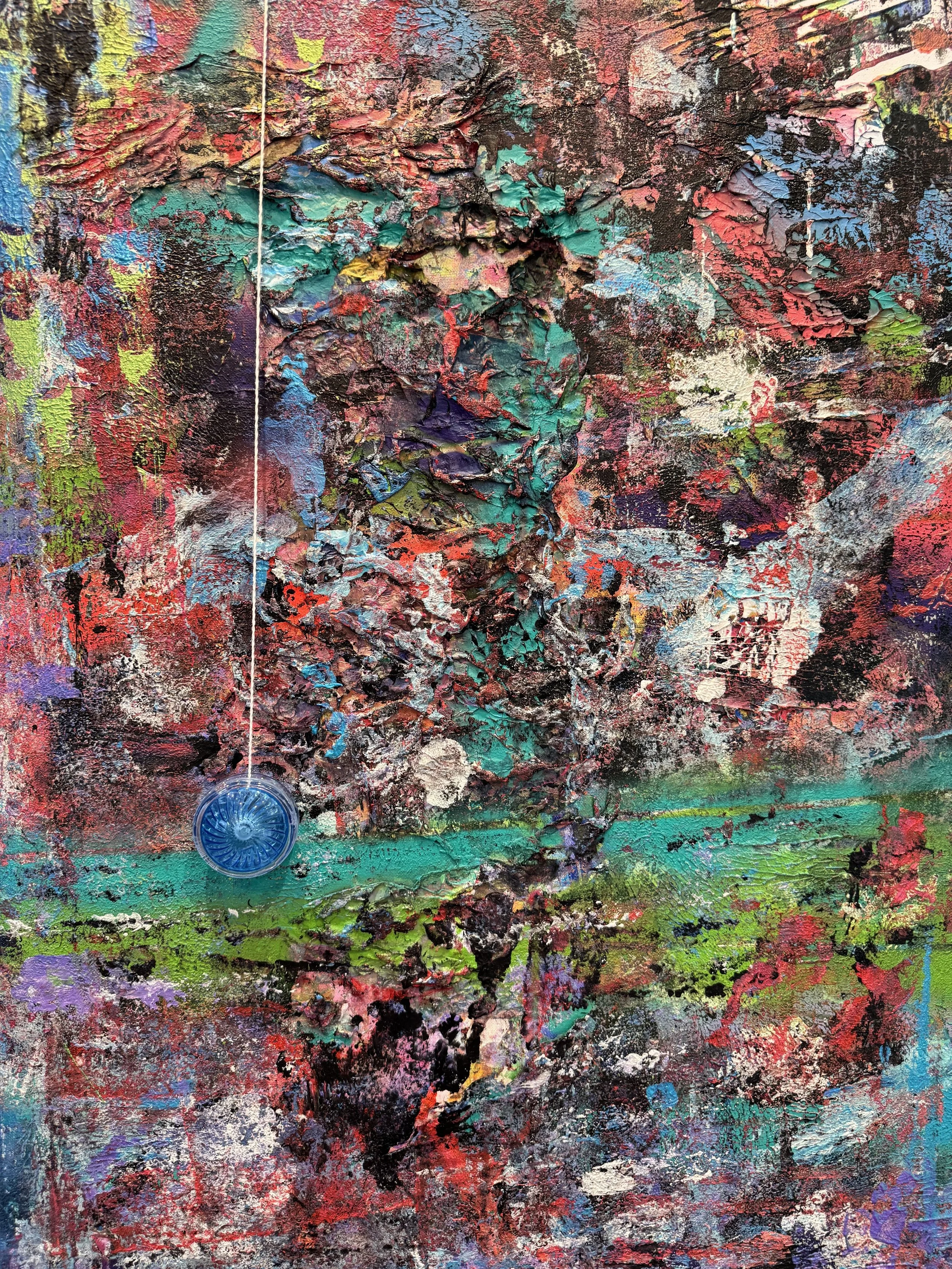 INFINITE RETURN | 24x30" | Mixed Media 

An abstract expressionist painting with thick, textured strokes in vibrant colors including red, black, green, purple, blue, and yellow. There is a plastic object with a string hanging from the top left corner