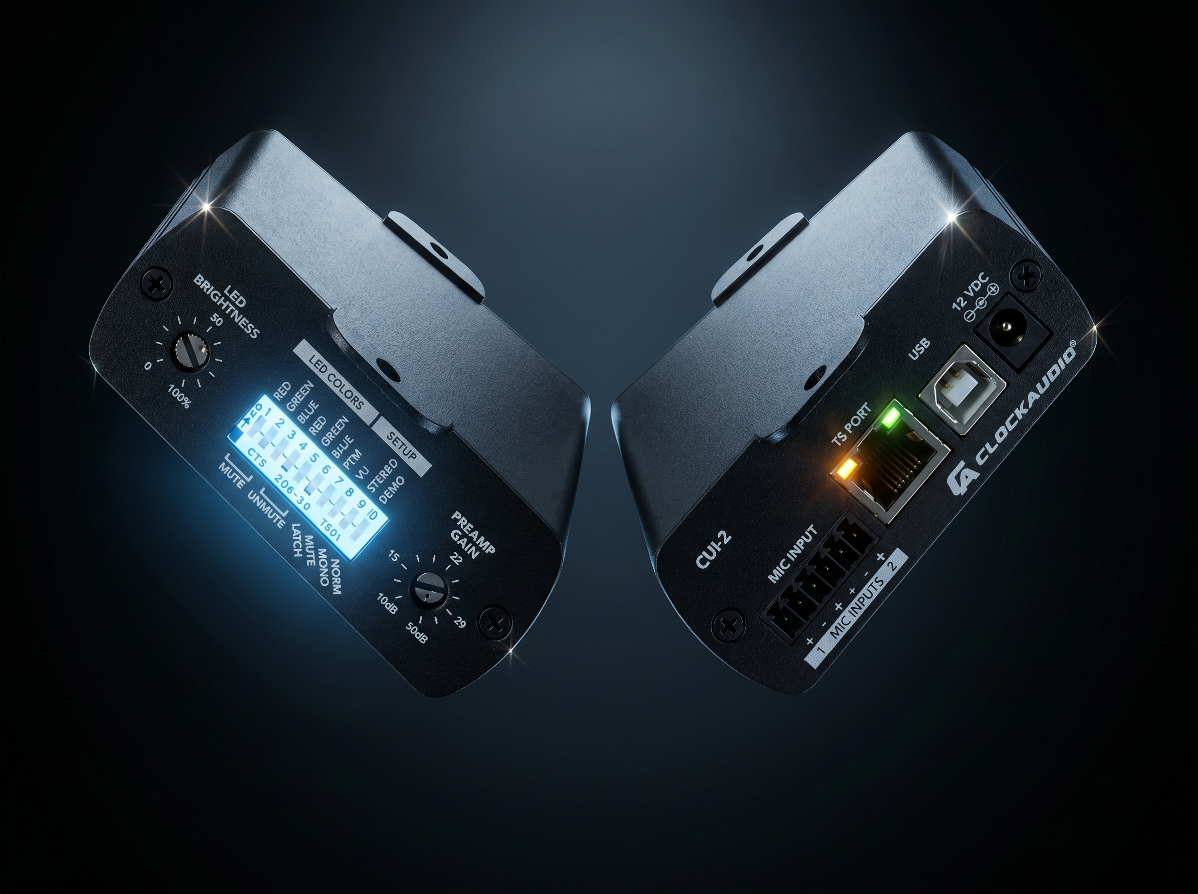 Close-up of professional audio equipment with illuminated display and various controls, set against a dark background.