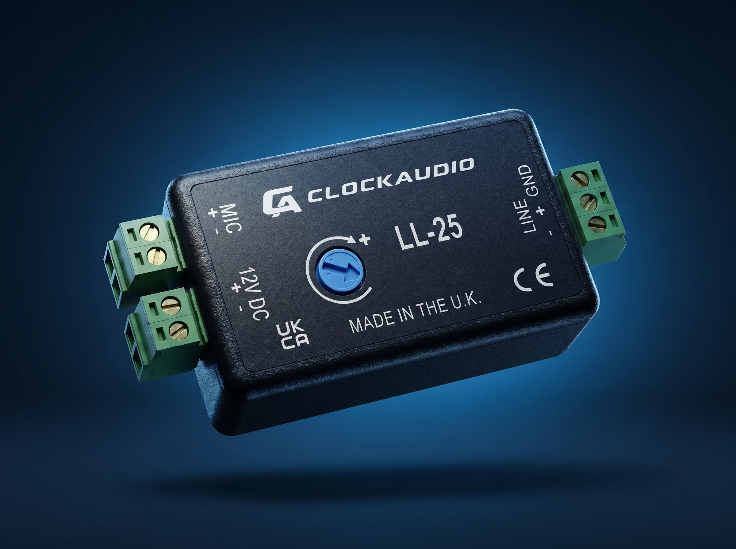 Close-up of a black electronic device labeled 'Clockaudio LL-25', with green terminal blocks on both sides, against a dark blue background.