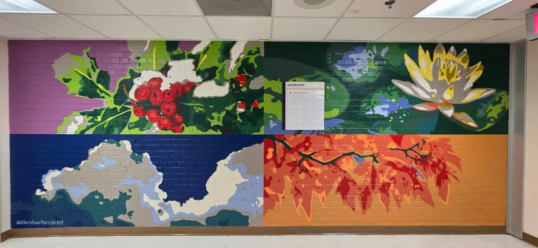 Colorful mural of four quadrants with nature scenes: top left with holly and berries, top right a white water lily, bottom left a mountain landscape, and bottom right red autumn leaves on a branch.