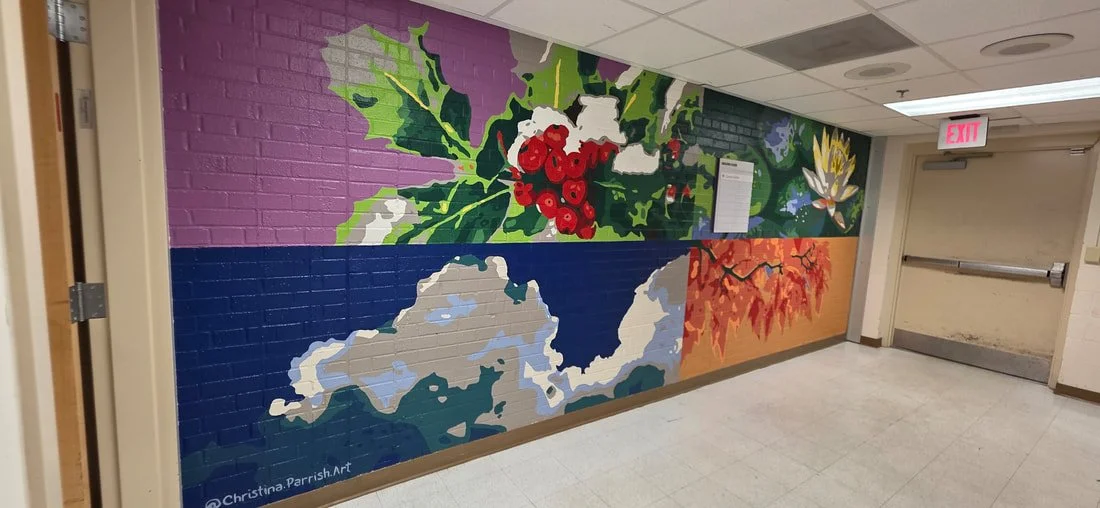 Colorful mural on a brick hallway wall showing various nature scenes divided into four sections, including holly berries and leaves, a dragonfly and lotus flower, an ice landscape, and autumn leaves.