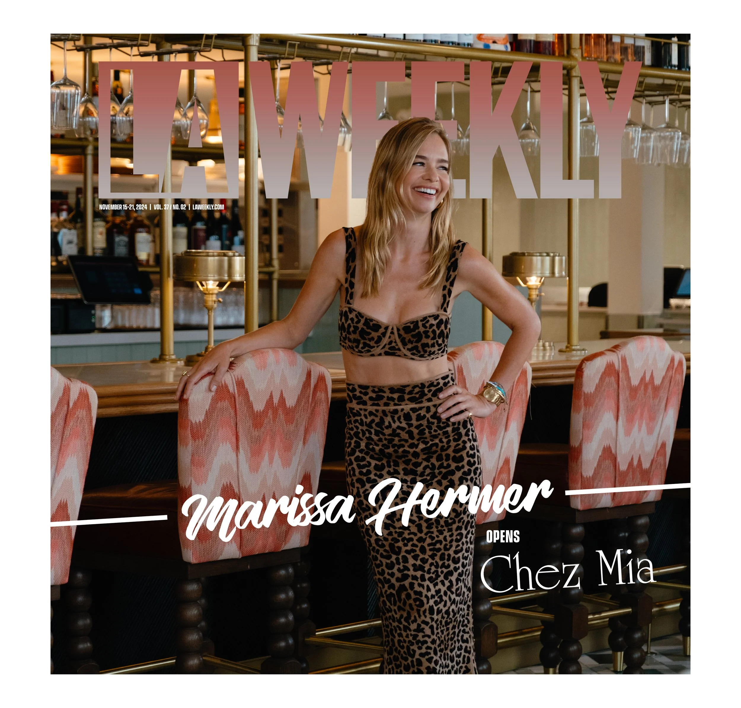 Magazine cover featuring a woman in a leopard print outfit standing in a bar area, smiling. The magazine is titled "LAWeekly" and the cover mentions Marissa Hermer opening a restaurant called Chez Mia.