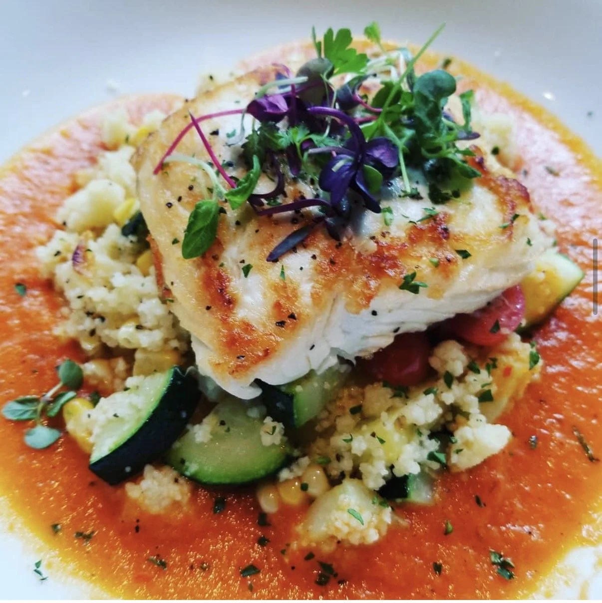 Alaskan Halibut, Cous Cous, Summer Squash, Roasted Red Pepper Sauce