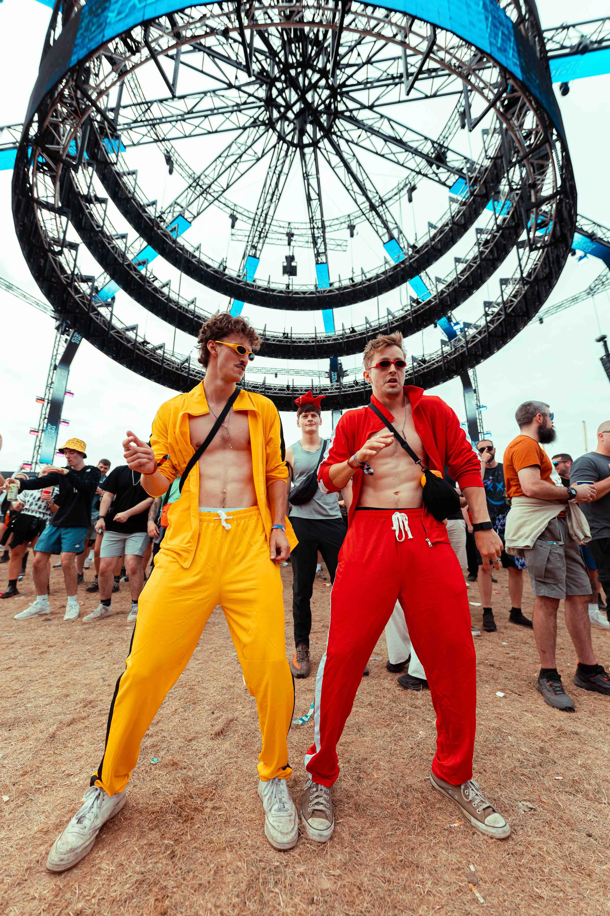 Two males dancing during the Creamfields festival