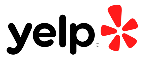 A black background with a red abstract flower-like shape.