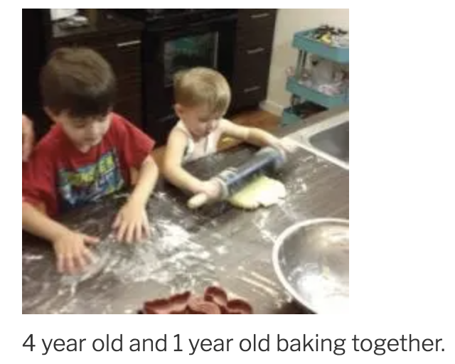Two young children baking cookies together