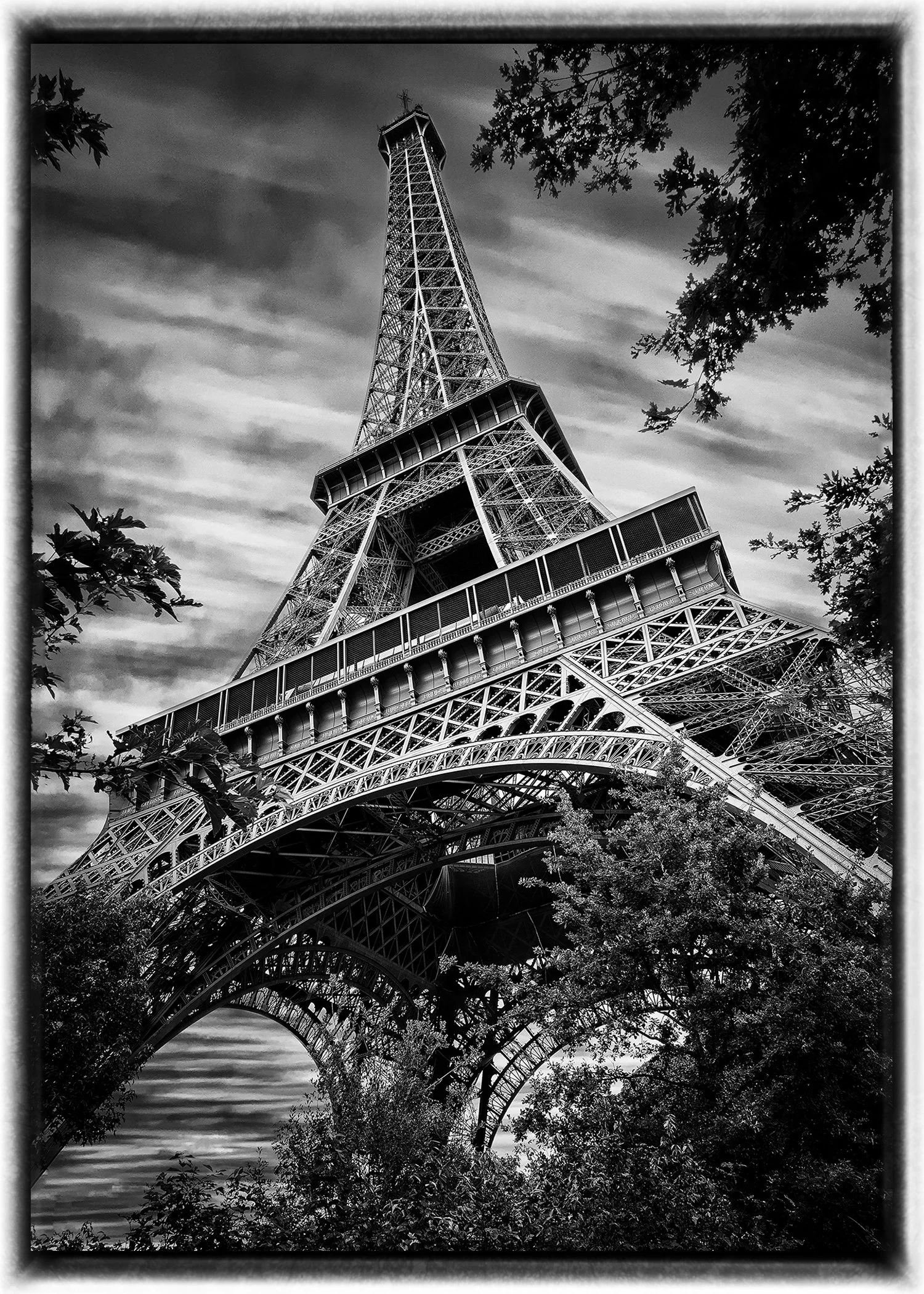 This captivating image was taken during my very first trip to Paris! Standing beneath the Eiffel Tower, no photo could ever fully prepare you for the sheer scale and grandeur of this iconic structure, but this piece comes close.
