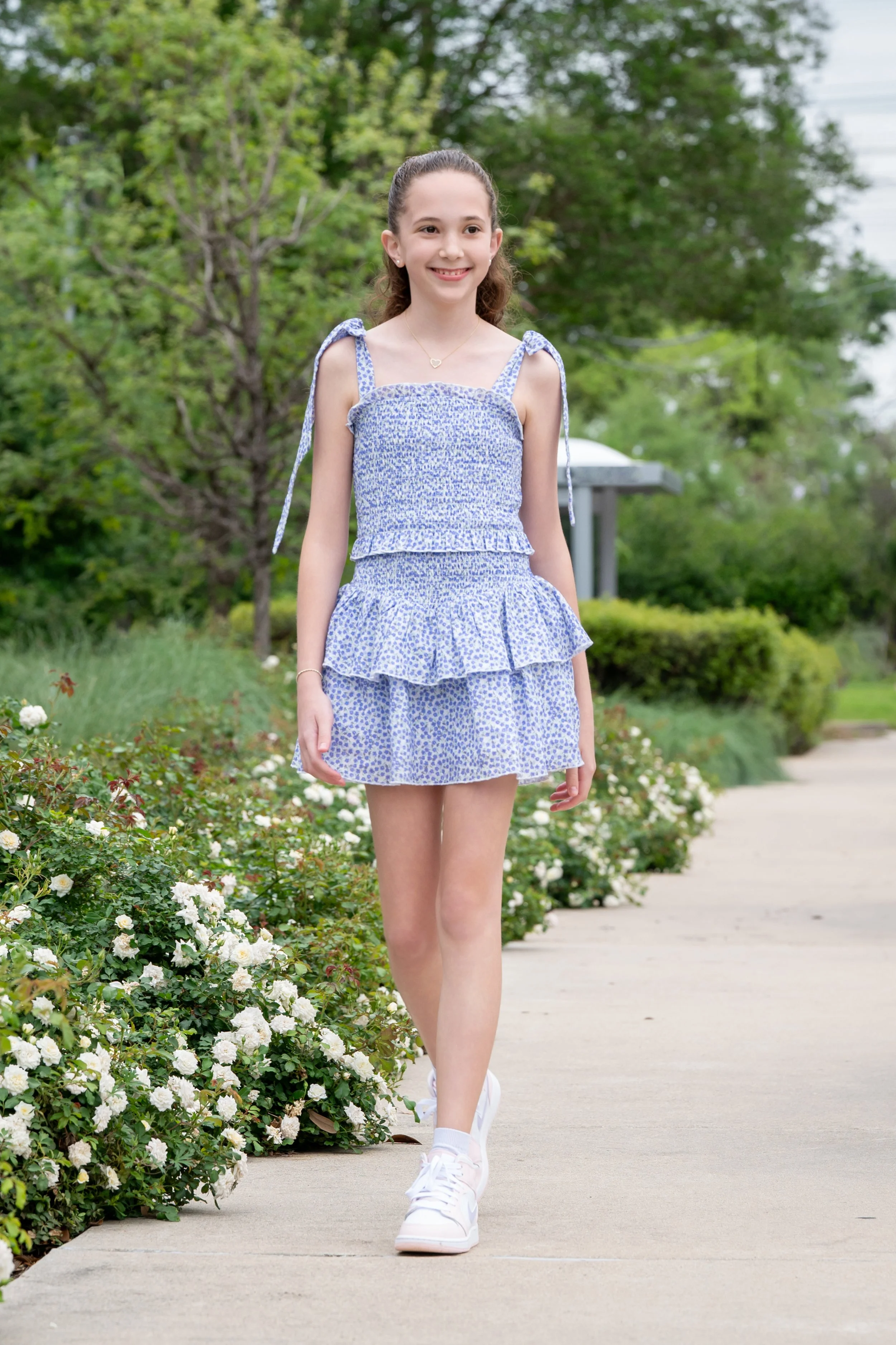 girl-walking-white-flowers.jpg