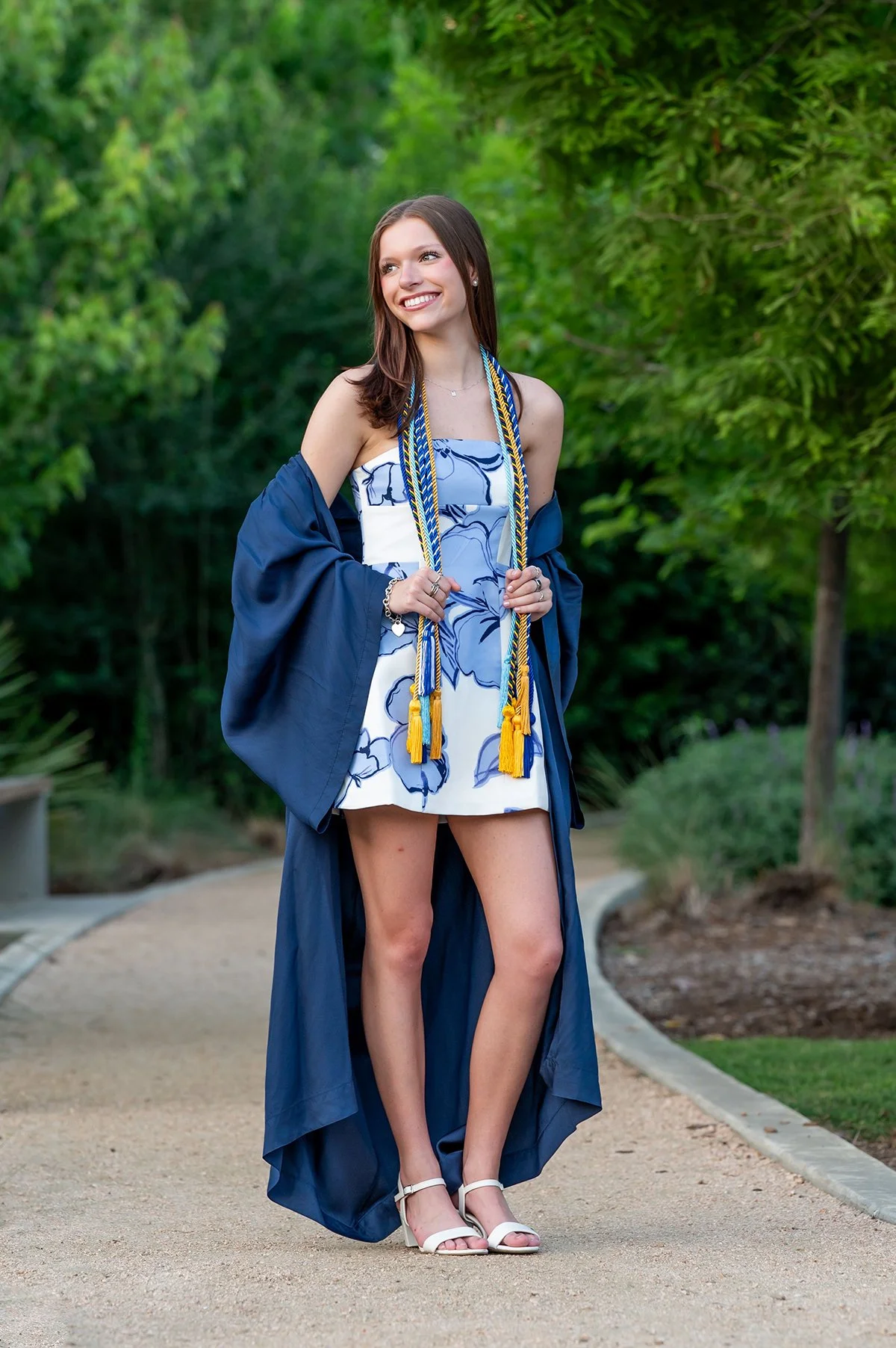 senior-girl-cap-gown-park.jpg