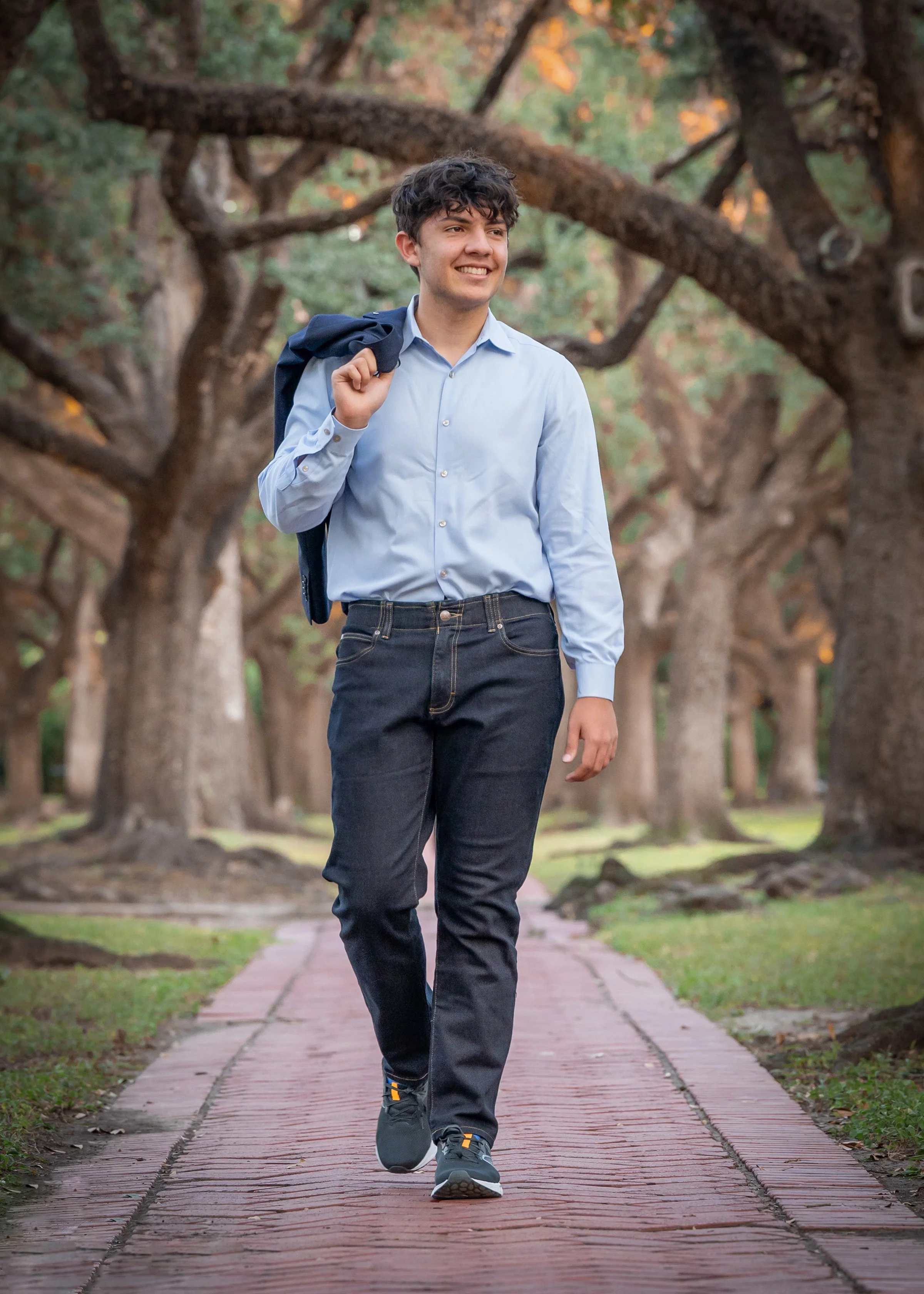 senior-guy-walking-jacket-over-shoulder.jpg