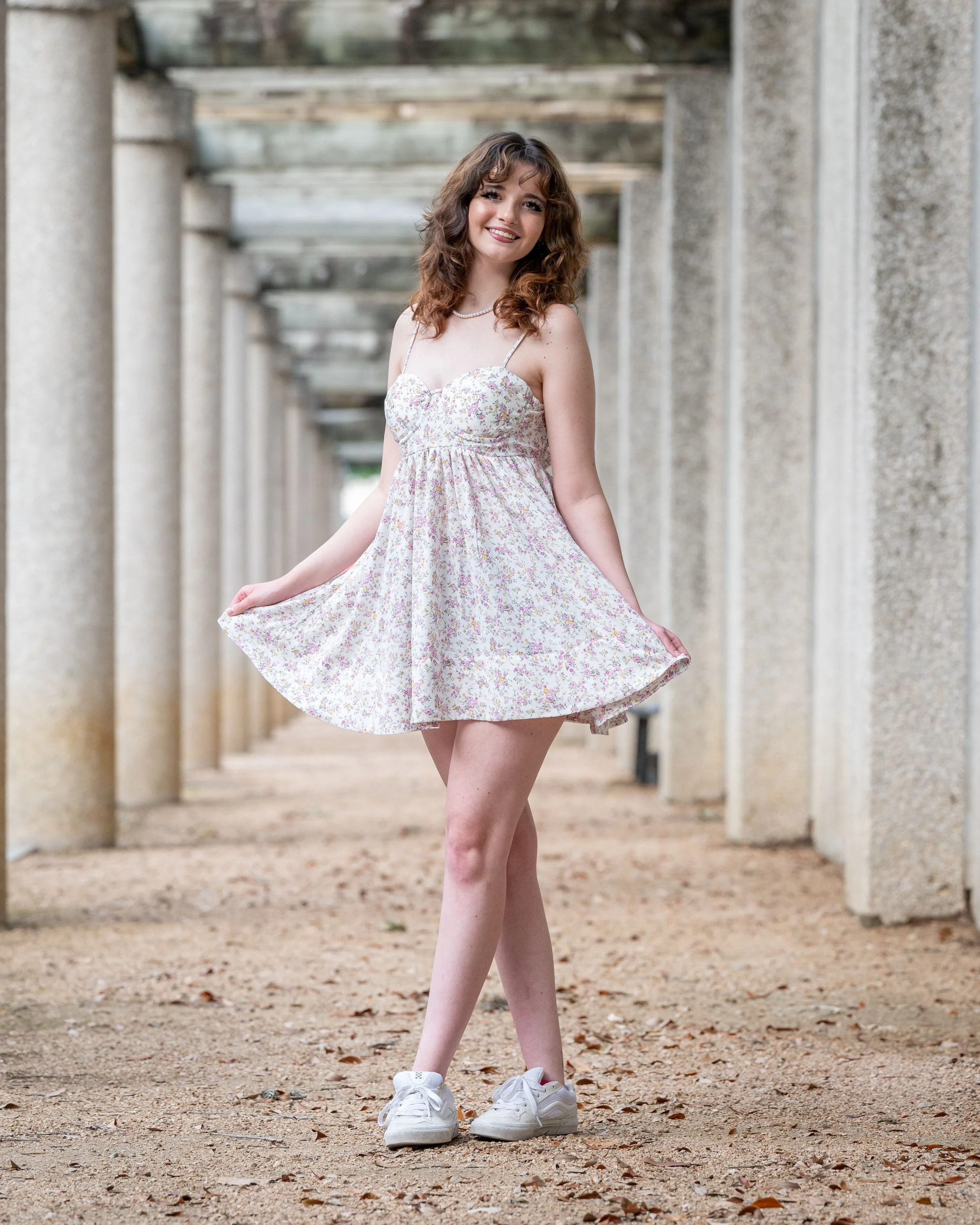 senior-girl-columns-cement.jpg