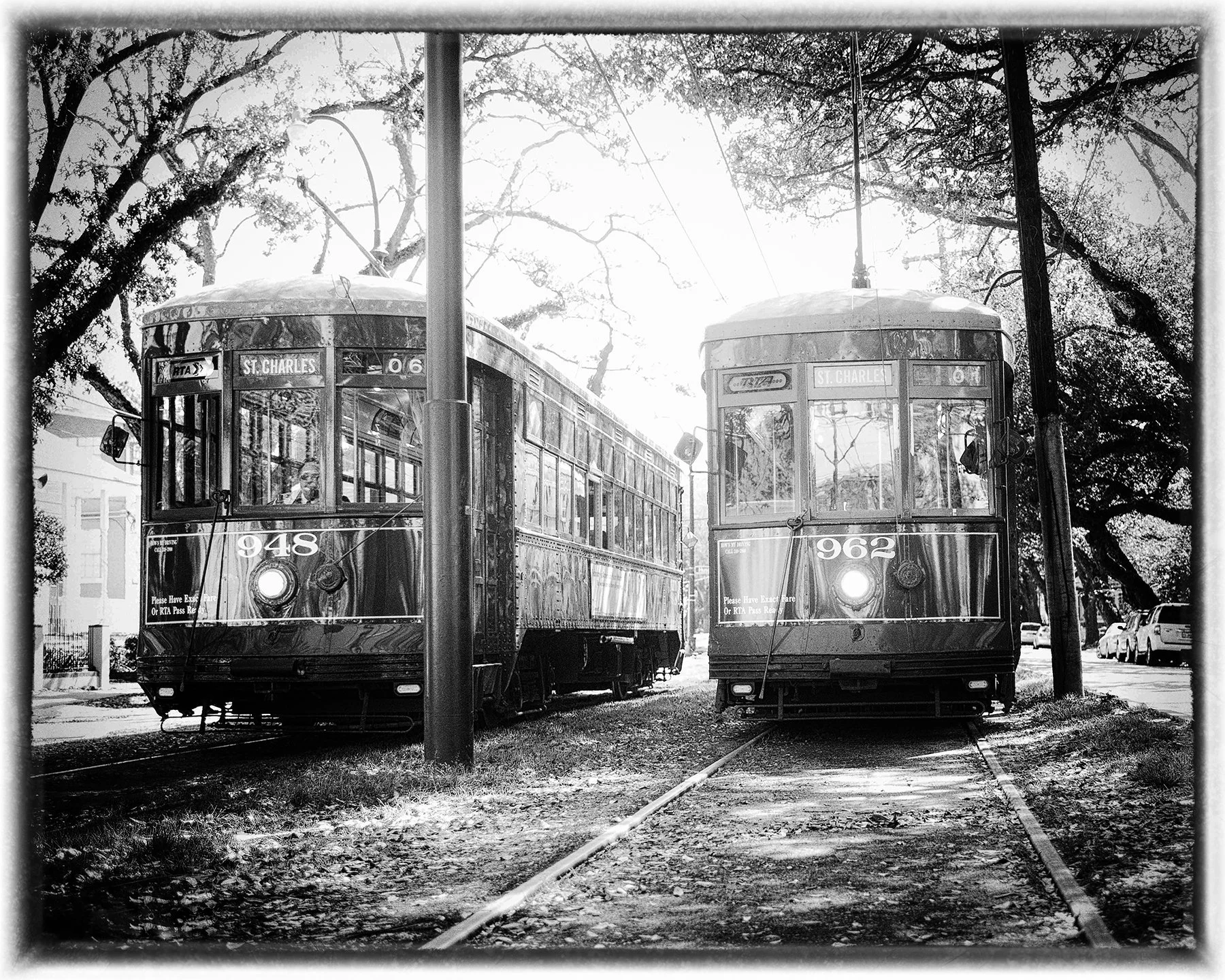 Captured during a spontaneous moment on St. Charles Avenue, this black and white photograph tells a story of timing, nostalgia, and the rhythm of New Orleans life. I was home for Mardi Gras in 2013 and had my camera with me when I spotted a streetcar