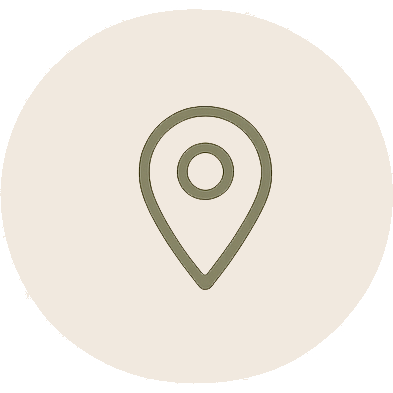 Map marker icon inside a circle with a black background.