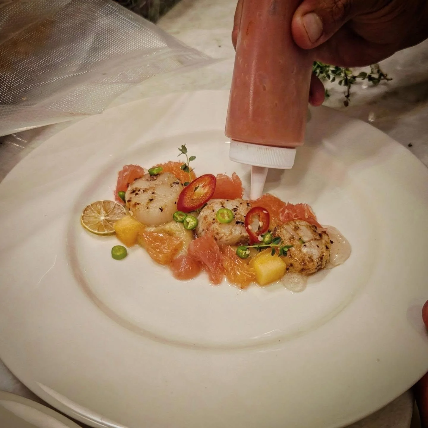 Seared scallops with citrus, fermented strawberry and white wine gel, red Serrano, lemon thyme, and parsnip coconut puree. #cheflife #troskoculinary #privatechef #chefstable
