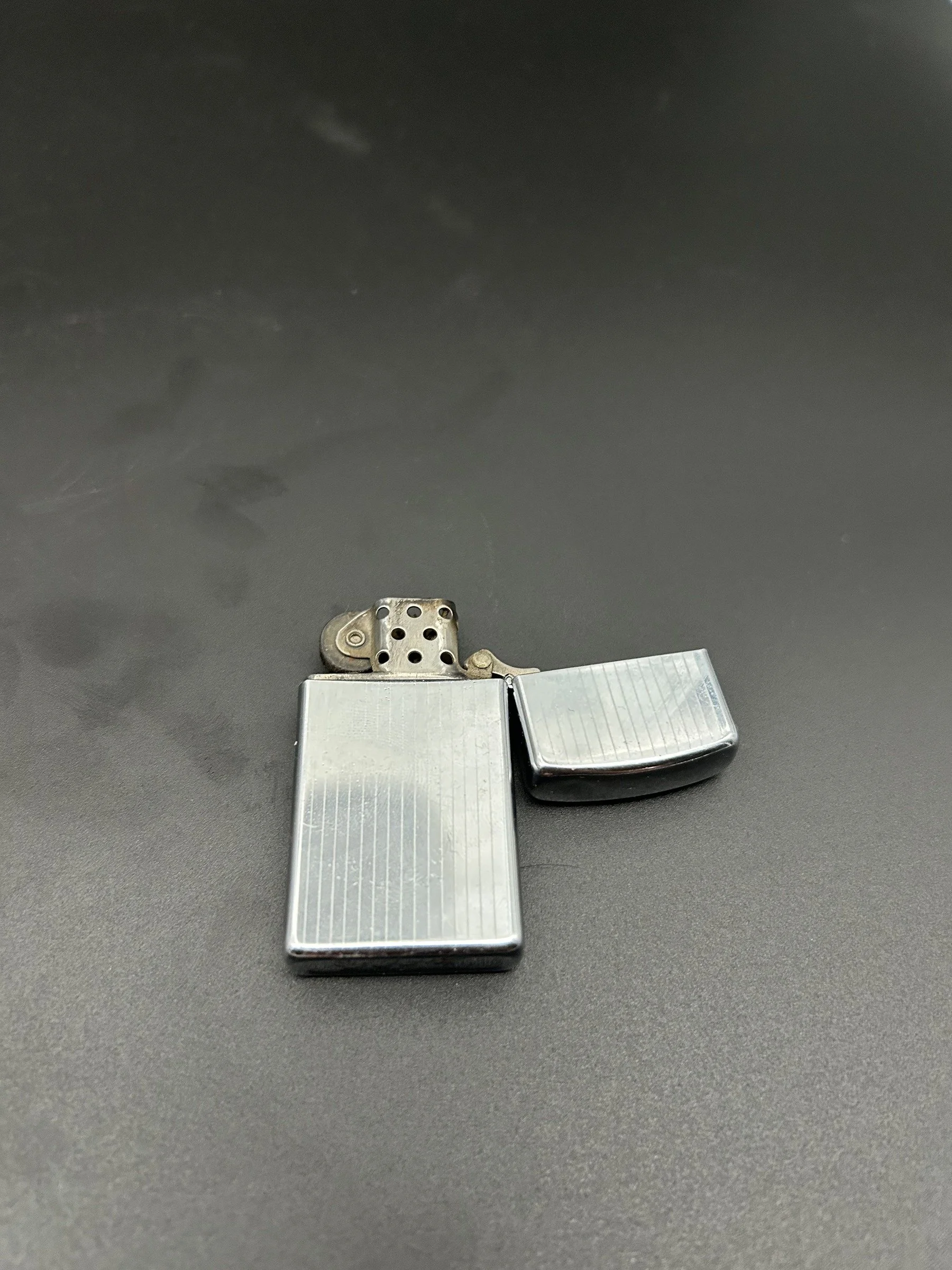 The Tale of the Soldier's Zippo, a Haunted Diagonal-Monogrammed Vintage Lighter, c. 1970, Vietnam Era - Polished Chrome over Brass