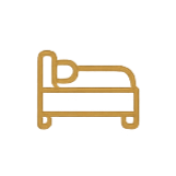 A simple illustration of a bed with a pillow at the head.