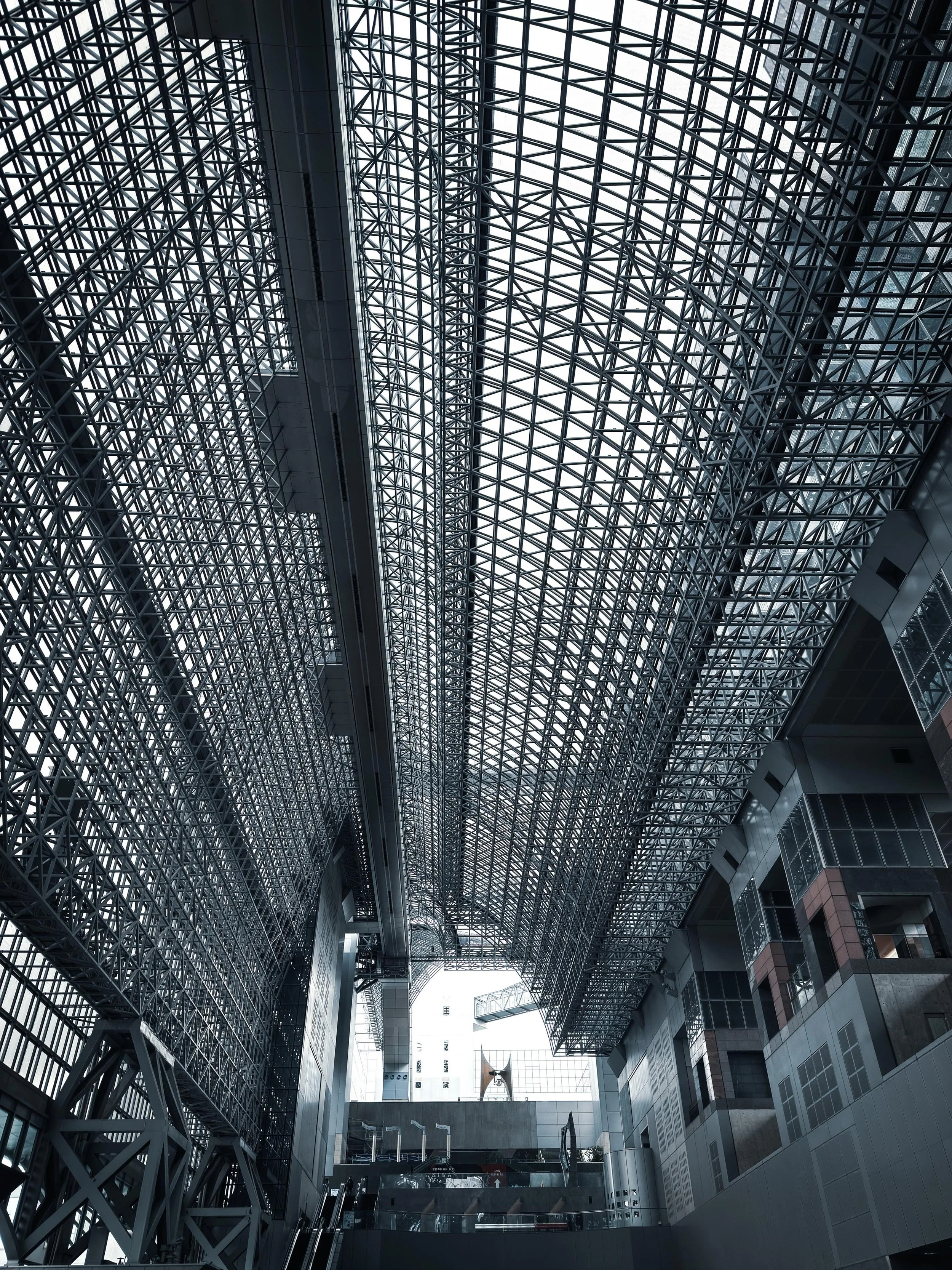 Japan, looking up.
Spent days walking Kyoto, Osaka and Tokyo with the Leica. Kept finding myself craning my neck.
The Umeda Sky Building is something else in person. Escalators that feel like portals. Rooftops that open up like craters over the city.