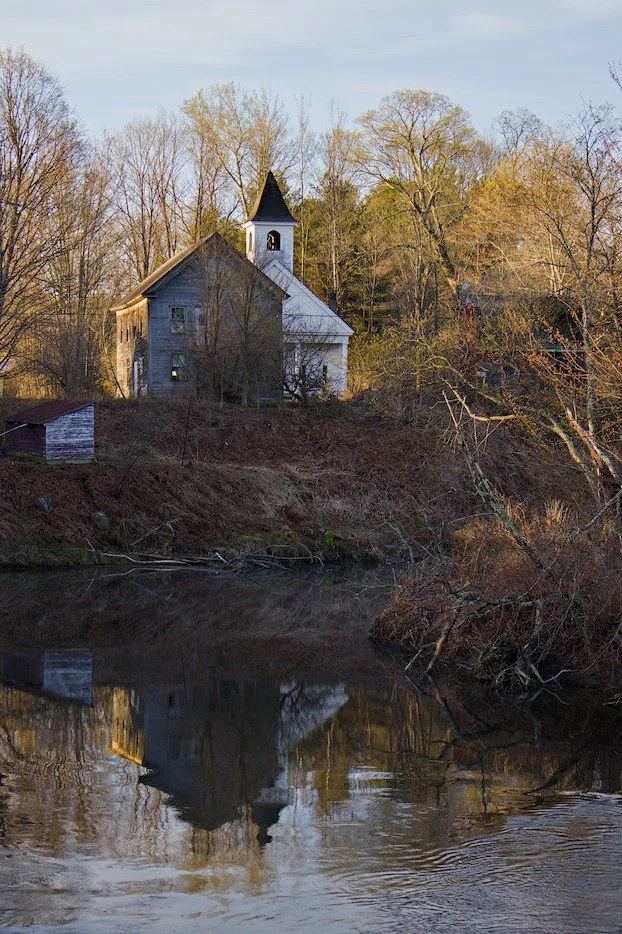 Old church with reflection, late autumn