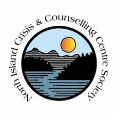 Logo of North Island Crisis & Counselling Centre Society featuring a scenic nature view with water, trees, mountains, and a bright sun.