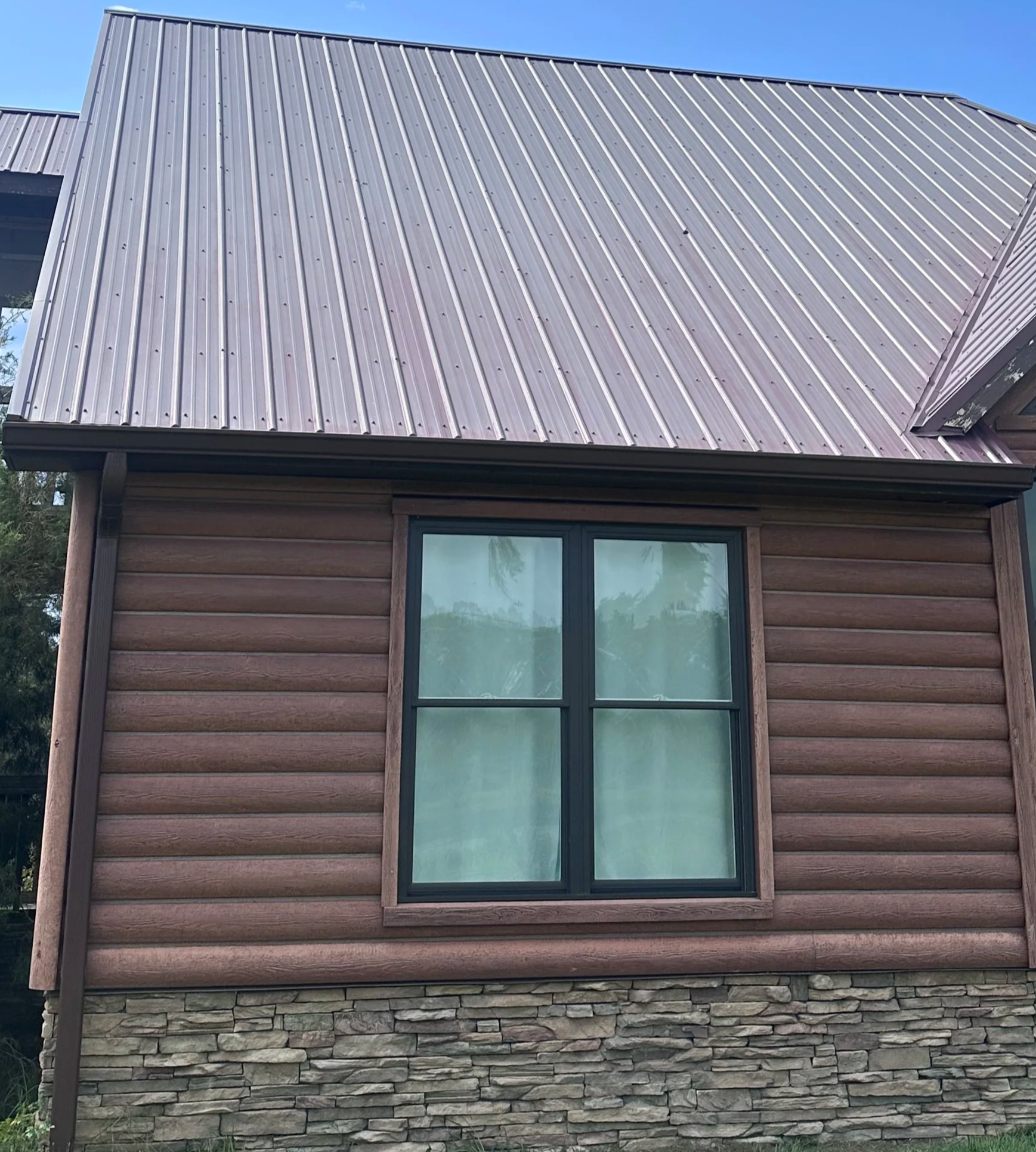 Before and after roof washing in Statesboro GA by Stephens Exteriors