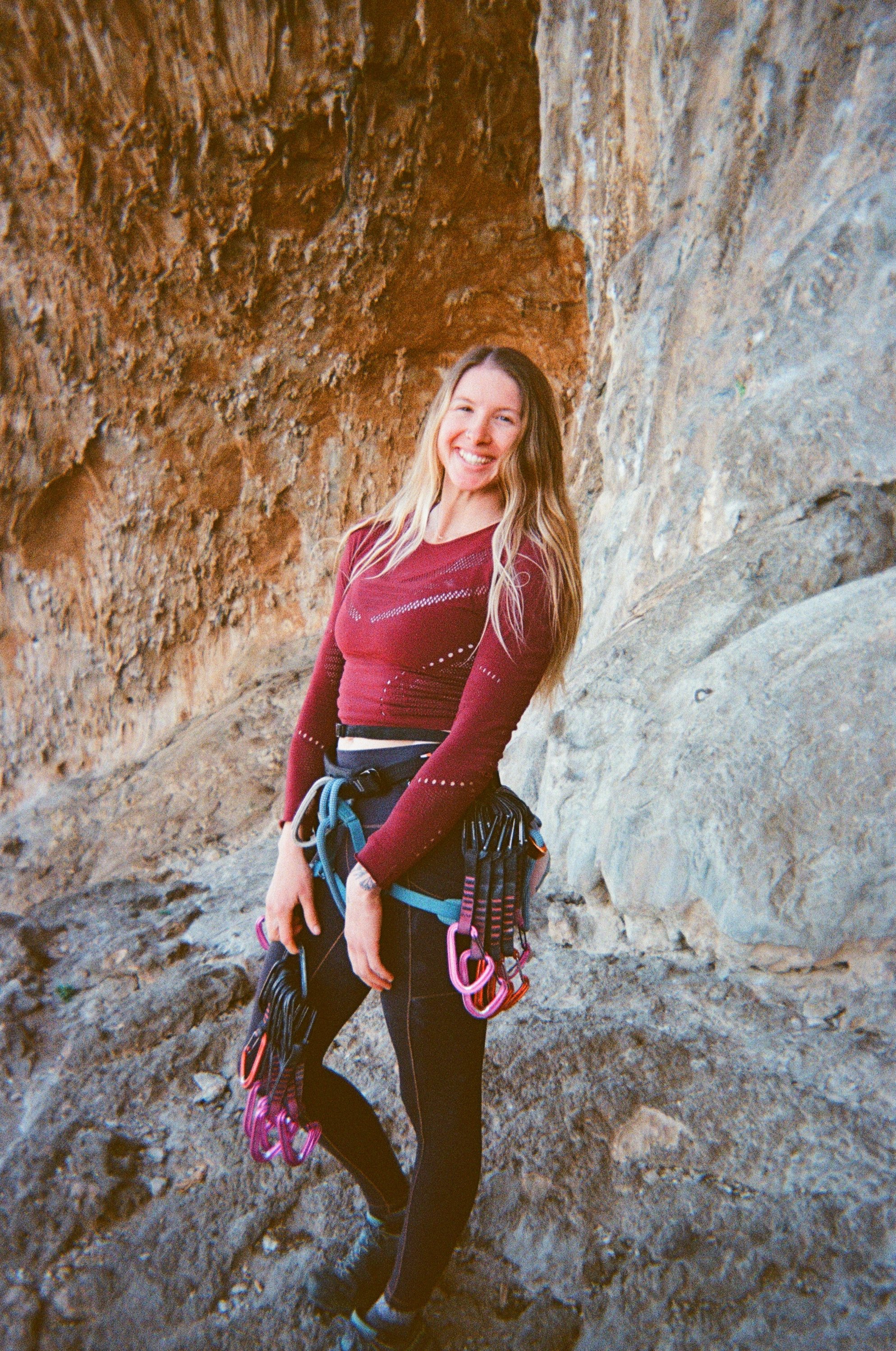 Nicole Sands, owner of Sierra Summit Photography. Rock climbing in Kalymnos Greece in December. In the Grand Grotta Climbing area.