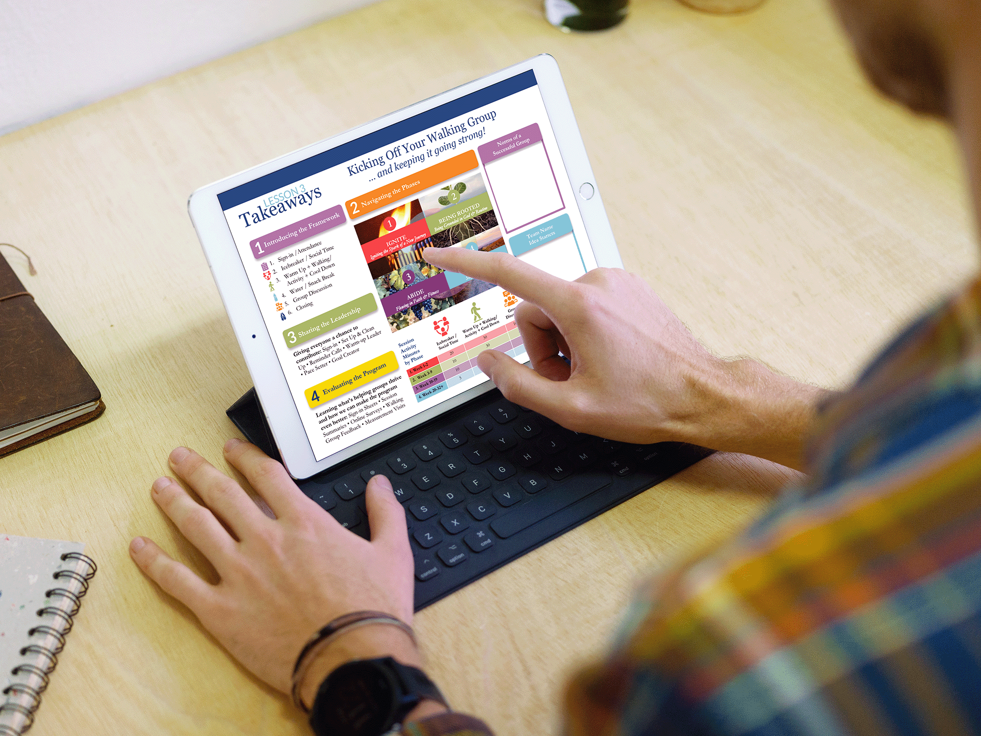 A person using a tablet with a keyboard cover, viewing a presentation slide titled 'Lesson 3: Takeaways' with colorful sections and bullet points about a training session.
