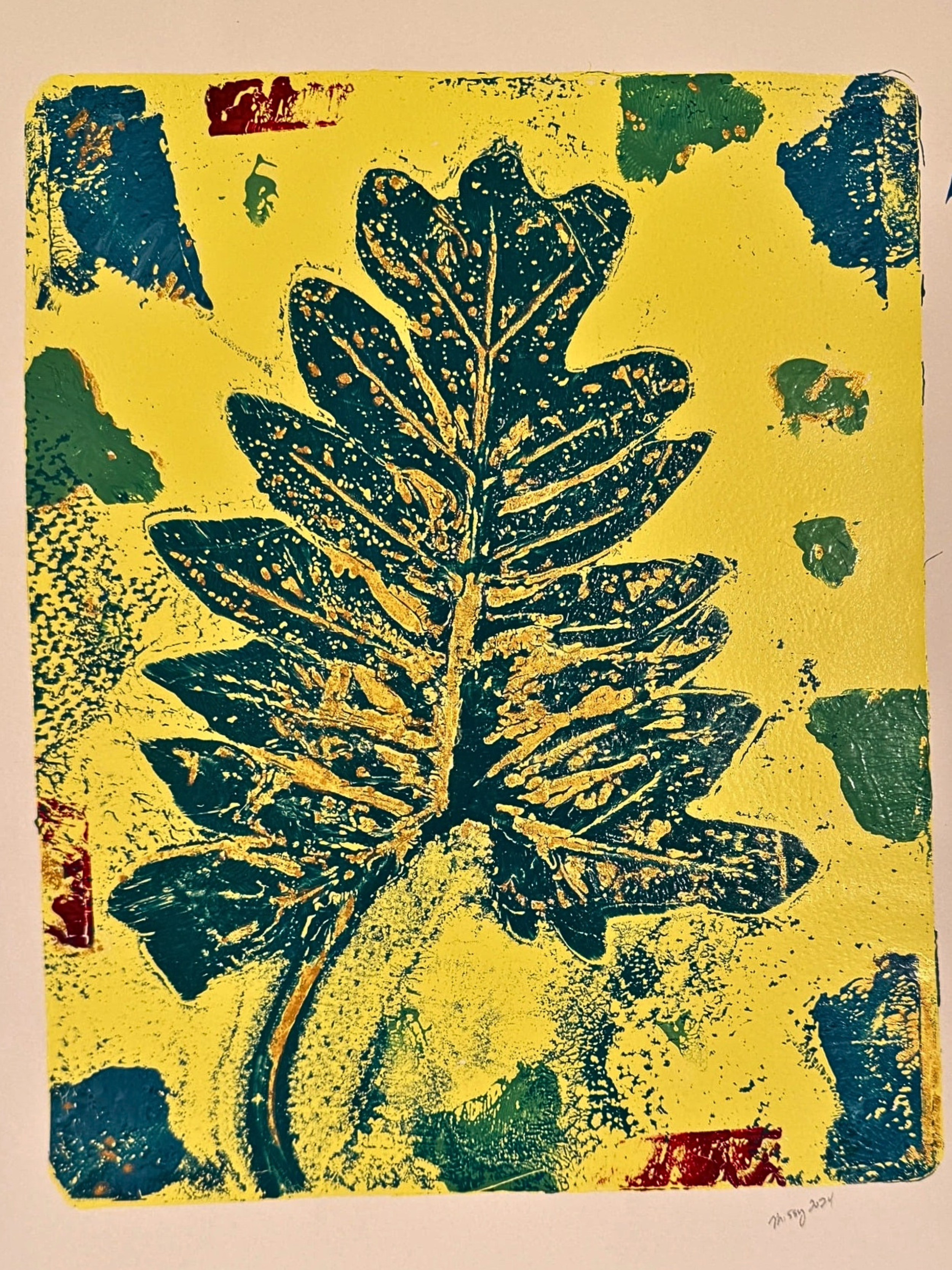 Yellow gel print with dark teal botanical leaf and scattered textured shapes, creating a bold high-contrast composition.