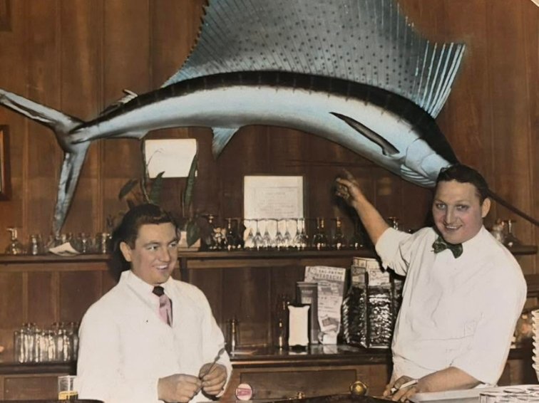 Buzzy Pacanowski and Jim Hayden tending bar at Munzerts in 1955.