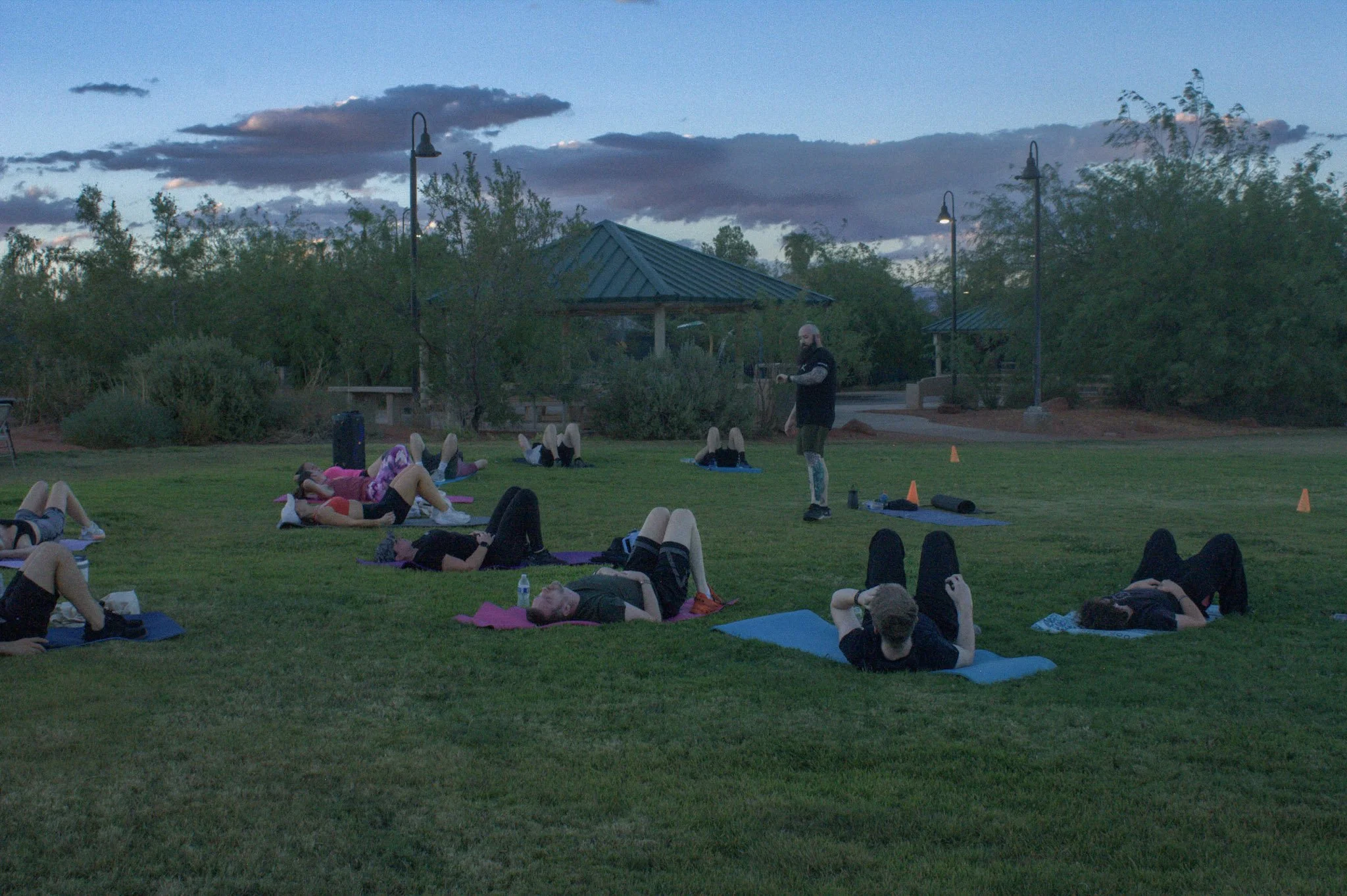 Collin Guillotte leading participants through Frontline Sanctuary’s outdoor Tabata class.
