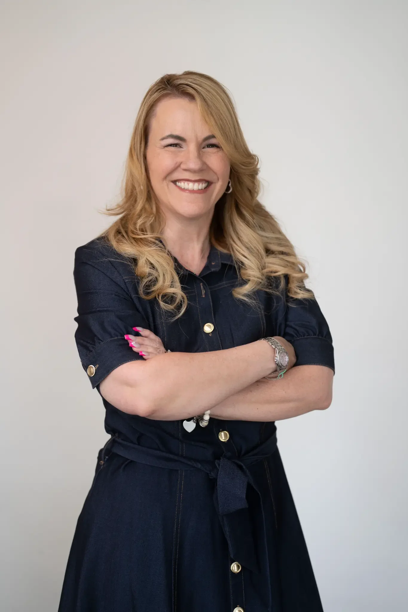 Frontline Sanctuary partner Kellyann Woodburn smiling for a portrait.