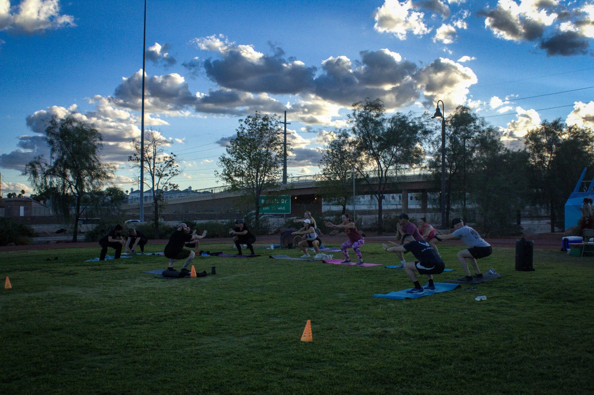 Participants exercising together at Frontline Sanctuary’s outdoor Tabata class.