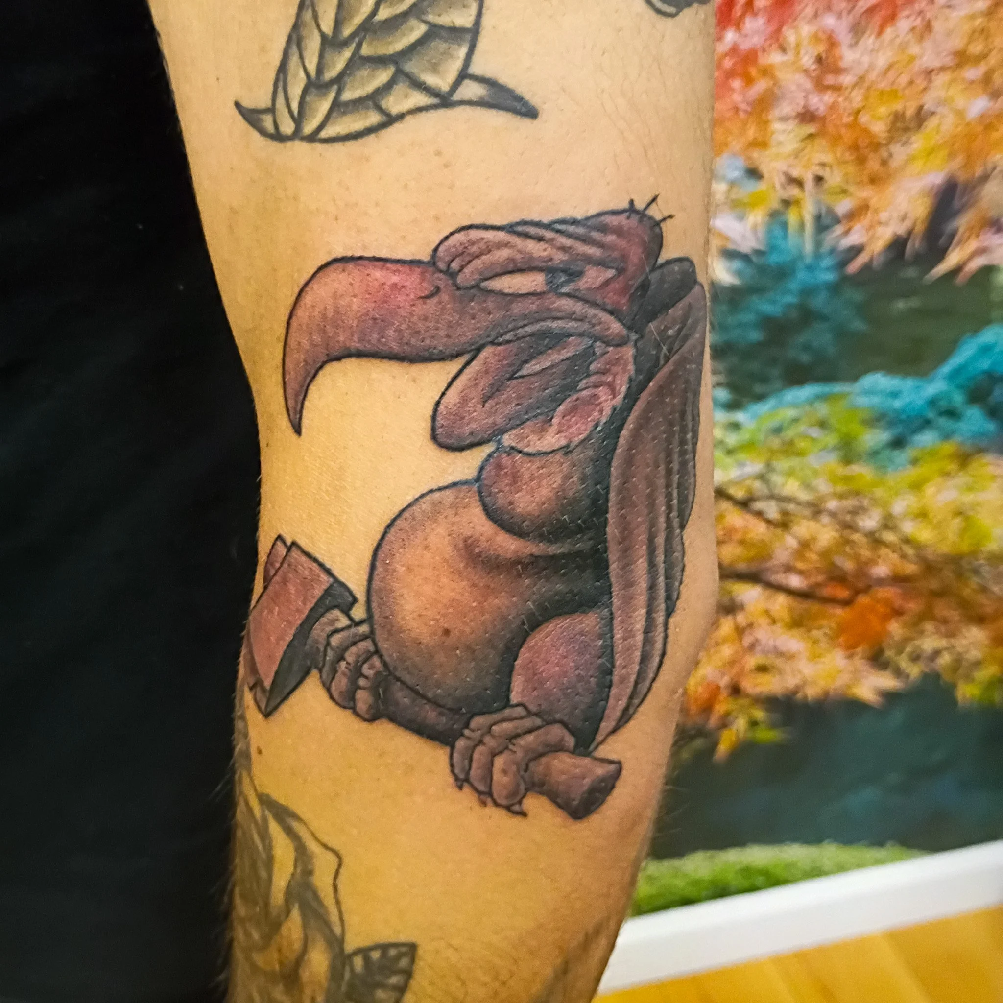 looney tunes inspired black and grey vulture tattoo
