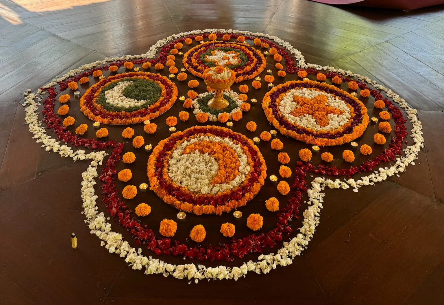 No actual photos of my travels altars exist so please enjoy this flower mandala from Bagus Jati in Bali to break up all the words ;)