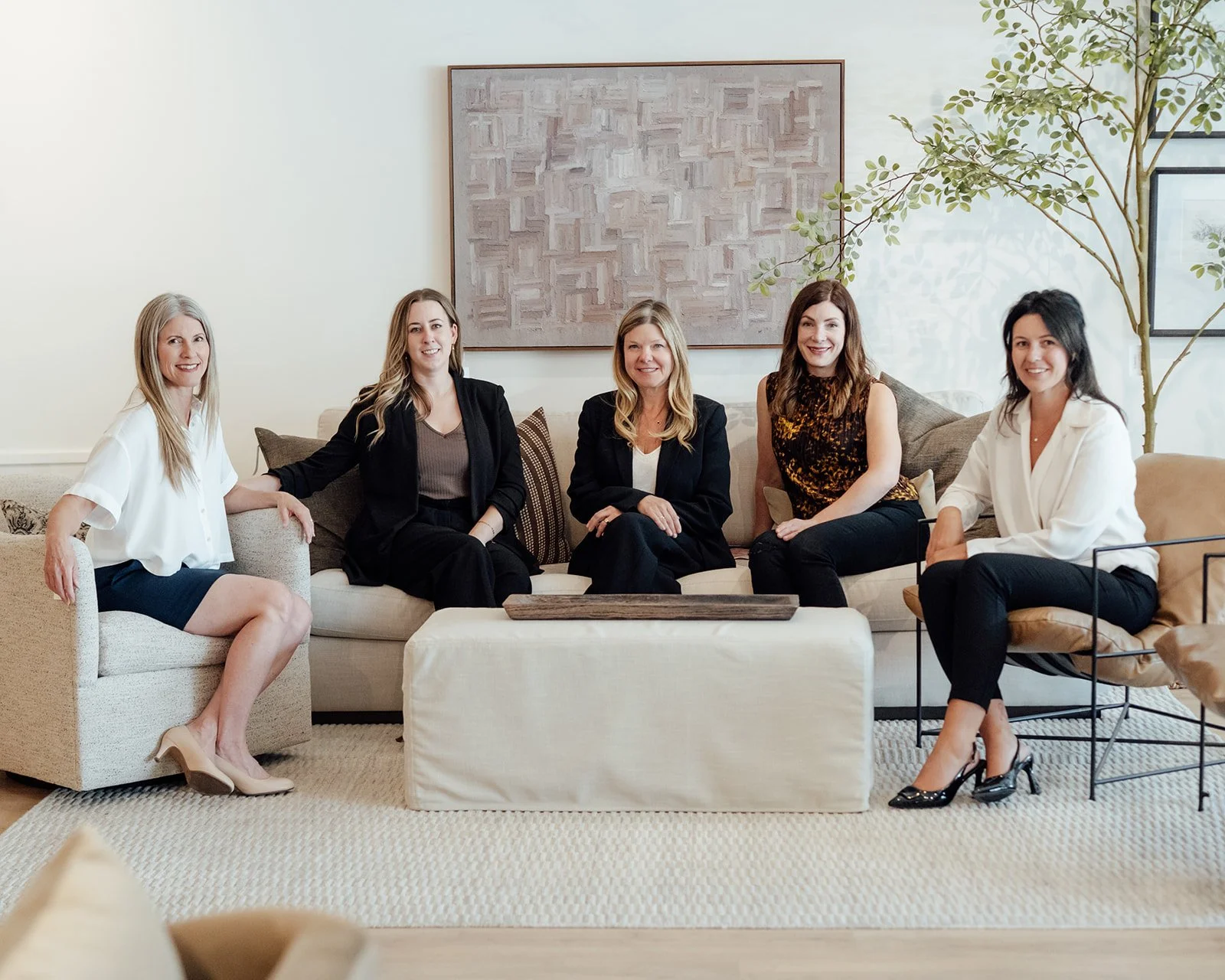 The Interior Law LLP legal team together in their office.