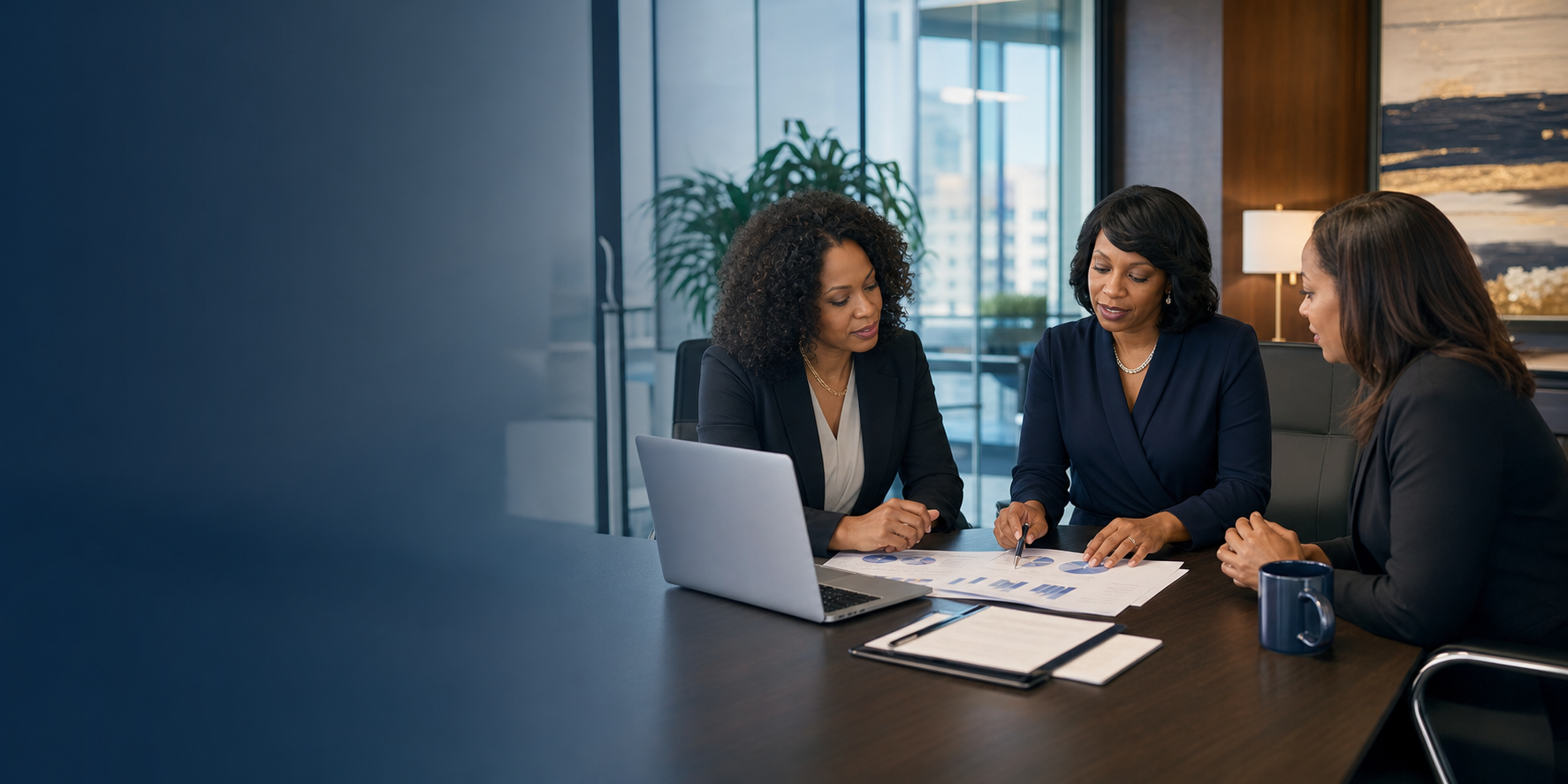 Professional finance consultants reviewing reports in an executive meeting