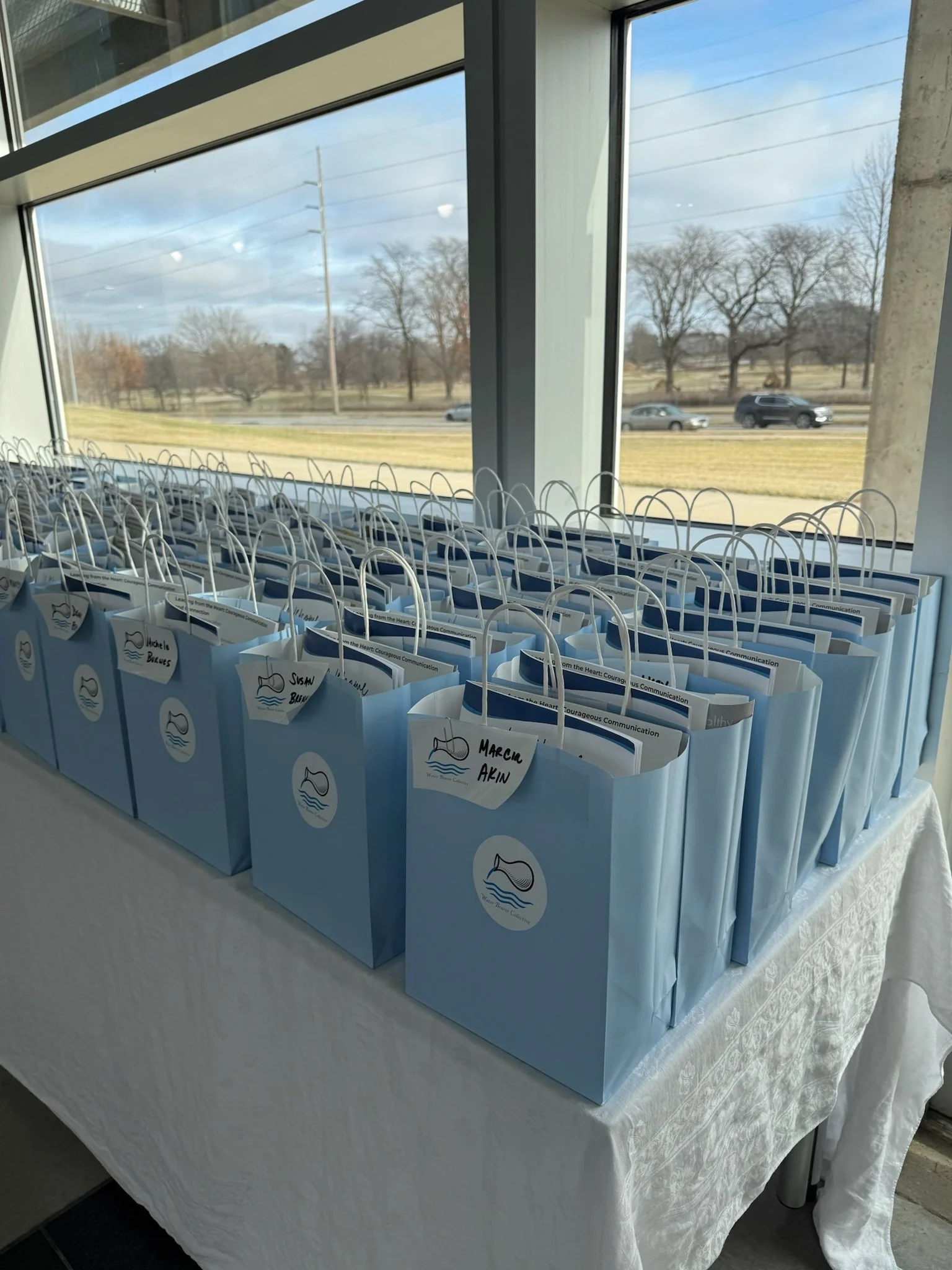 water bearer event gift bags.jpeg