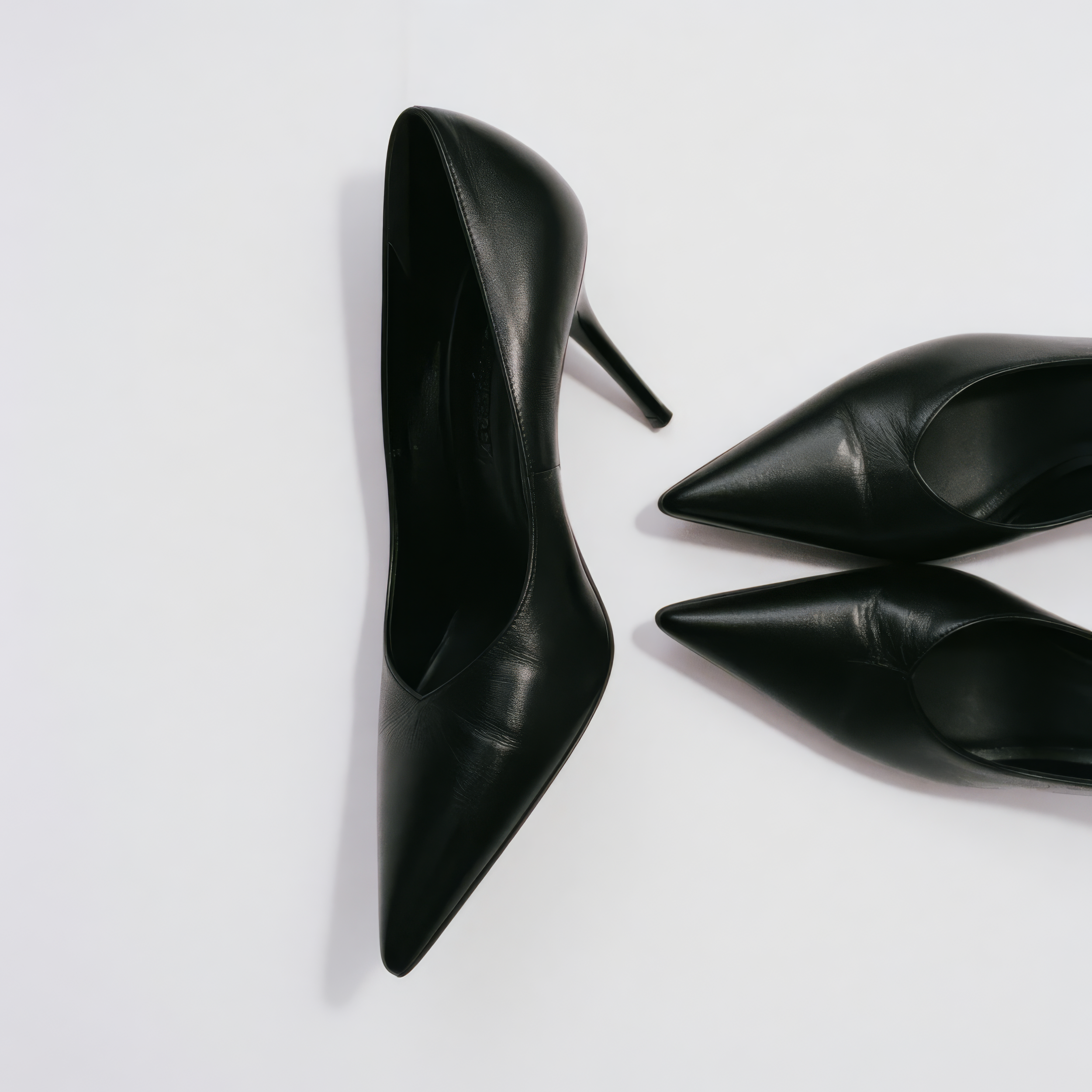Black heels and wardrobe accessories for personal styling services