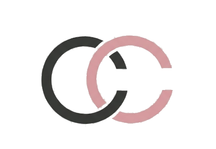 Close-up of three colored rings in black, pink, and gray overlapping, with a gray bar through the rings.