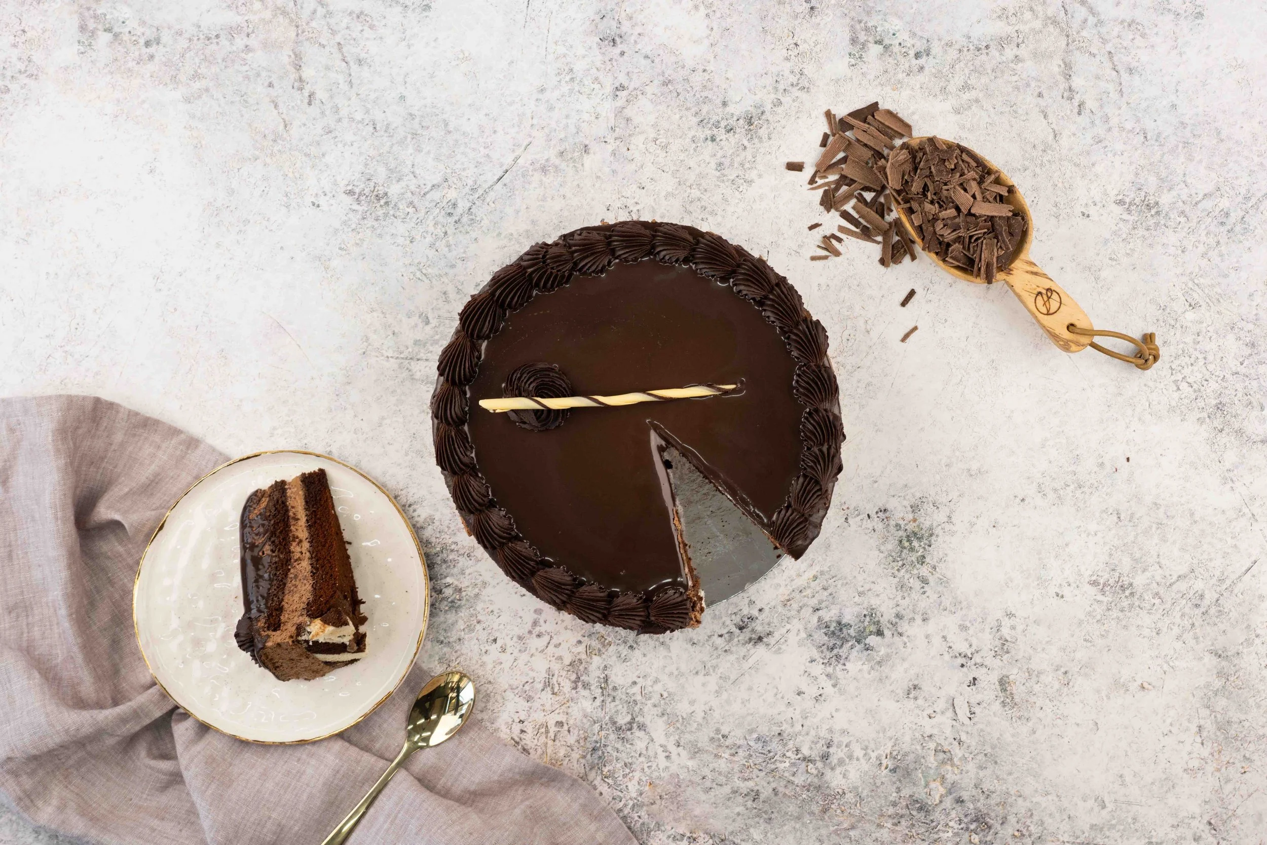 Elegant, single-serving wholesale mousse desserts and sweet treats ready for cabinet display.