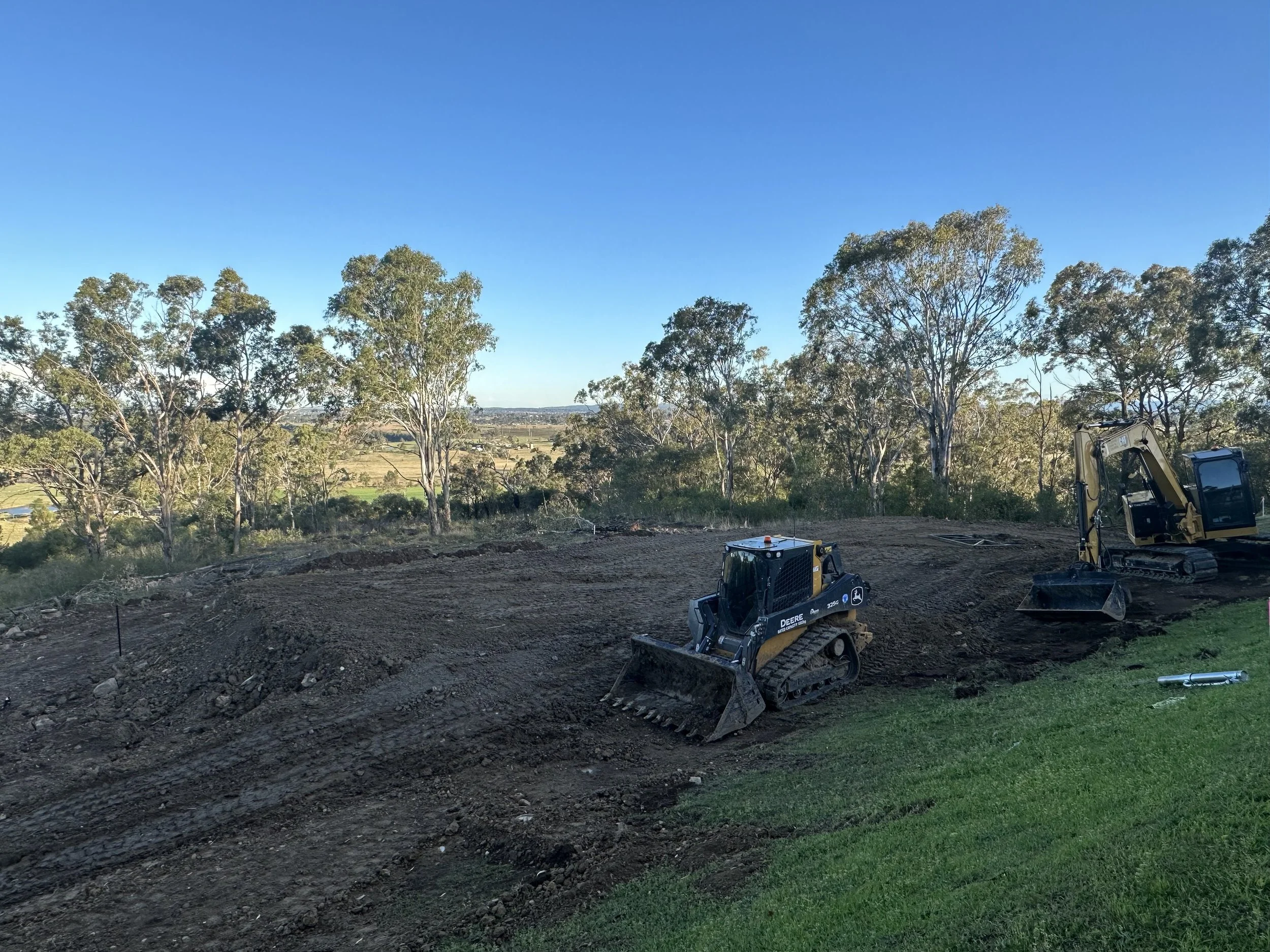 Construction site with bulldozers and excavated dirt