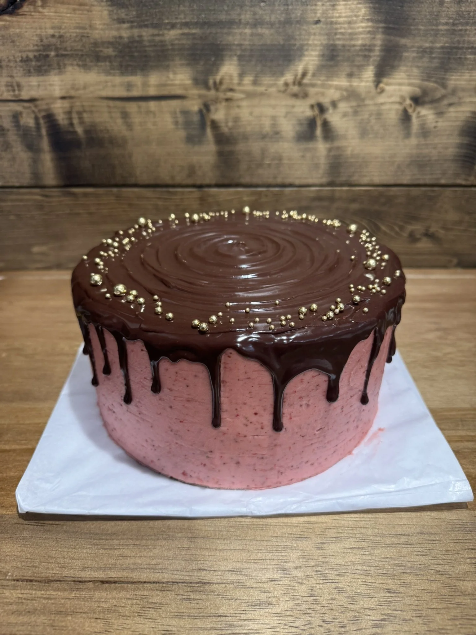 Strawberry cake strawberry buttercream with chocoalte ganache.JPEG