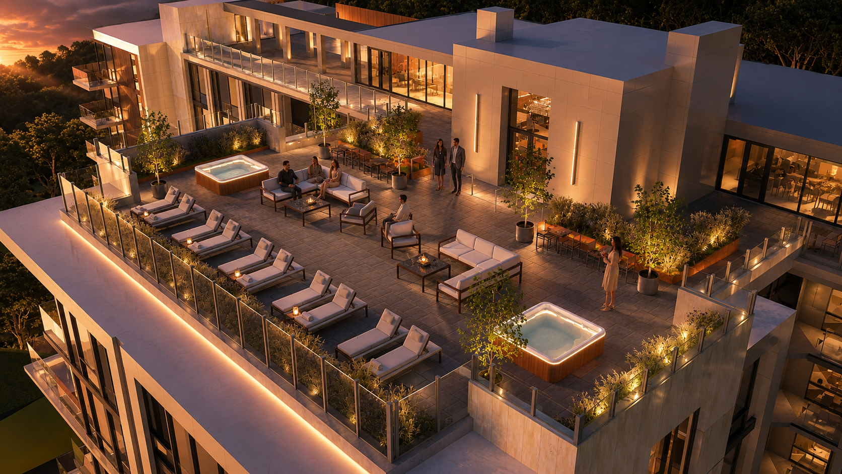 Nighttime rooftop terrace with lounge chairs, hot tubs, and outdoor seating areas, illuminated by ambient lighting, with a modern building surrounded by trees.